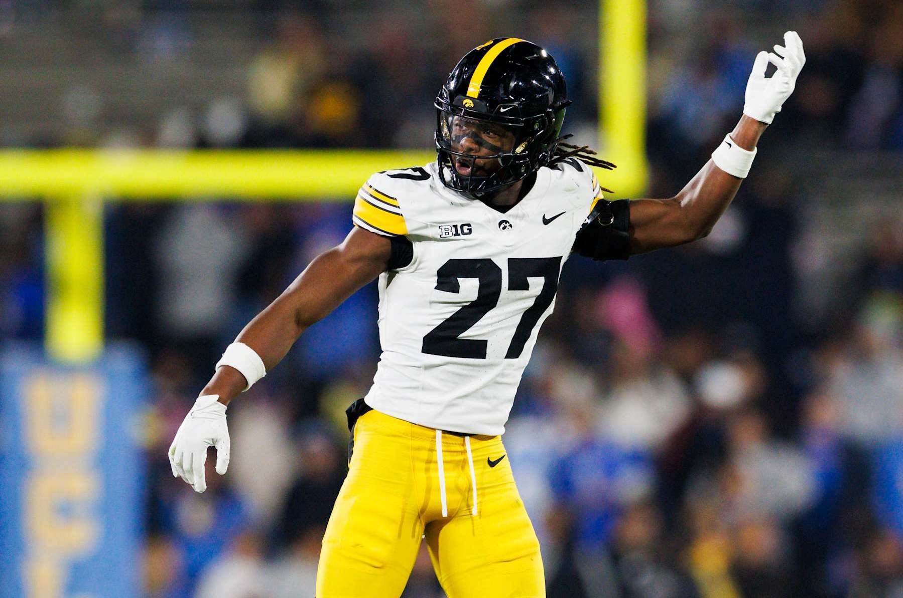 PASADENA, CALIFORNIA - NOVEMBER 8: Jermari Harris #27 of the Iowa Hawkeyes signals during the second half game against UCLA Bruins at Rose Bowl Stadium on November 8, 2024 in Pasadena, California. (Photo by Ric Tapia/Getty Images)