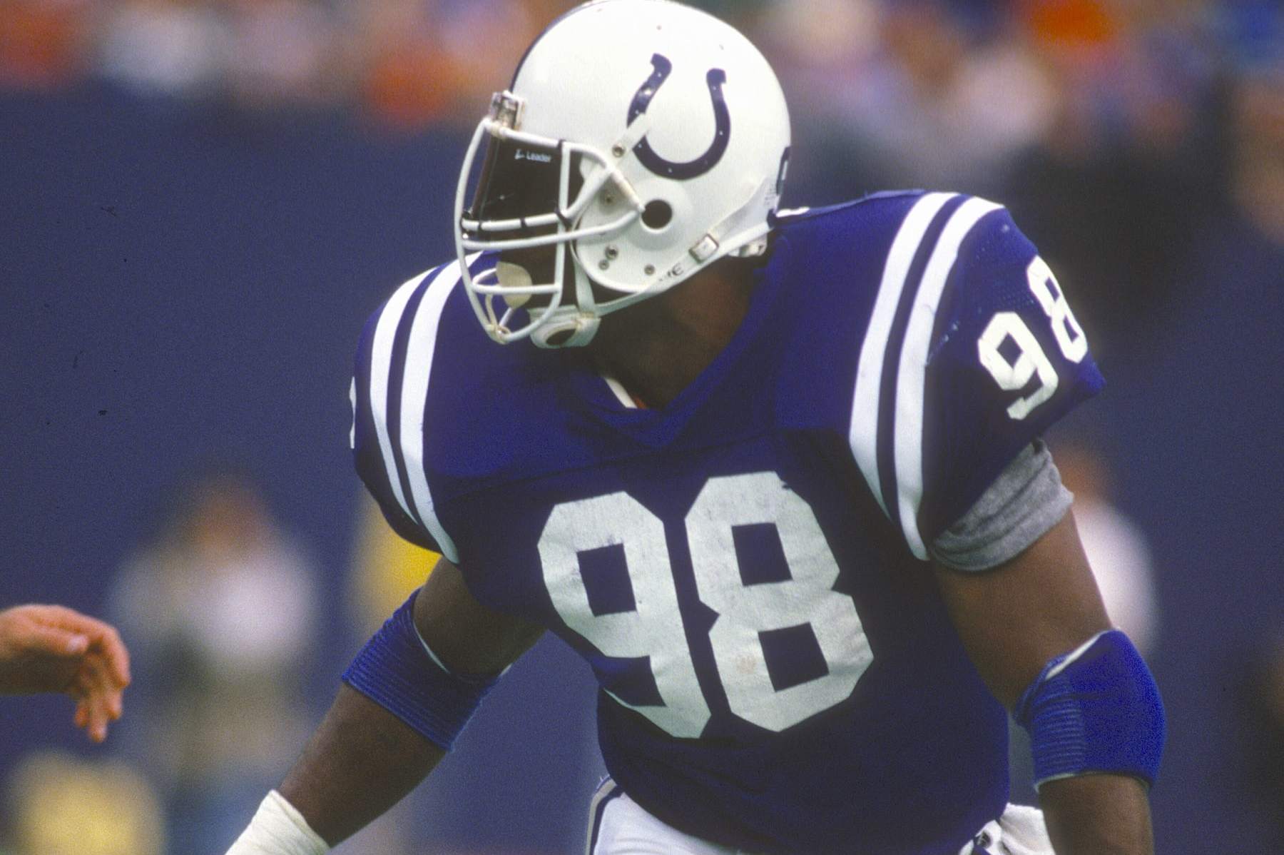 EAST RUTHERFORD - NOVEMBER 21: Johnie Cooks #98 in action against the New York Jets during an NFL football game November 21, 1982 at Giants Stadium in East Rutherford, New Jersey. Cooks played for the Colts from 1982-88. (Photo by Focus on Sport/Getty Images)