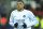 PSG's Kylian Mbappe warms up before the French League One soccer match between Paris Saint-Germain and Lyon at the Parc des Princes stadium in Paris, Sunday, April 2, 2023. (AP Photo/Aurelien Morissard)
