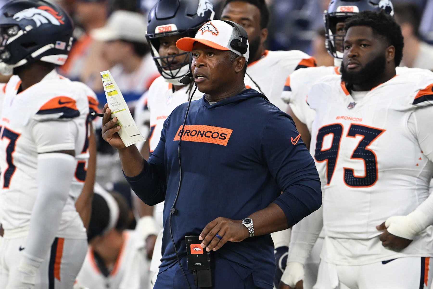 INDIANAPOLIS, INDIANA - AUGUST 11: Denver Broncos defensive coordinator Vance Joseph watches the action on the field at Lucas Oil Stadium in Indianapolis, Indiana on August 11, 2024. The Indianapolis Colts lost 34 to 30 against the Denver Broncos during the first NFL Preseason game of the 2024 summer for the two teams. (Photo by RJ Sangosti/The Denver Post)