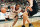 PHILADELPHIA, :  The Philadelphia 76ers' guard Allen Iverson (L), drives around the Cleveland Cavaliers' forward Matt Harpring (R) in the first period of their game 15 November 2000 at the First Union Center in Philadelphia. The 76ers won 107-98 and their record is now 8-0, the only undefeated team in the NBA. This also matches a club record, set in the 79-80 season and is the best in the 76ers franchise history. Iverson scored 22 points. (FILM) AFP PHOTO/ TOM MIHALEK (Photo credit should read TOM MIHALEK/AFP via Getty Images)