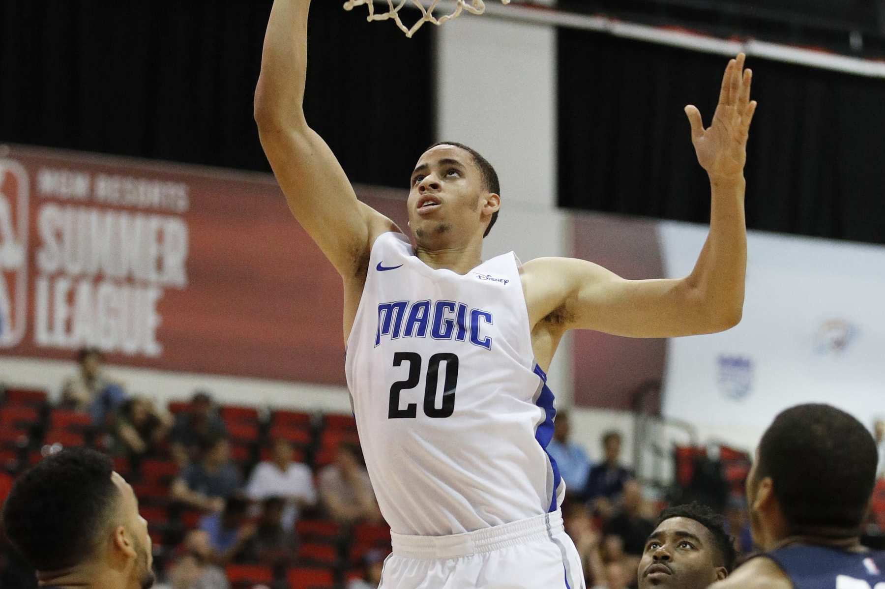 Orlando Magic's Chance Comanche shoots against the Utah Jazz during the first half of an NBA summer league basketball game Thursday, July 12, 2018, in Las Vegas. (AP Photo/John Locher)