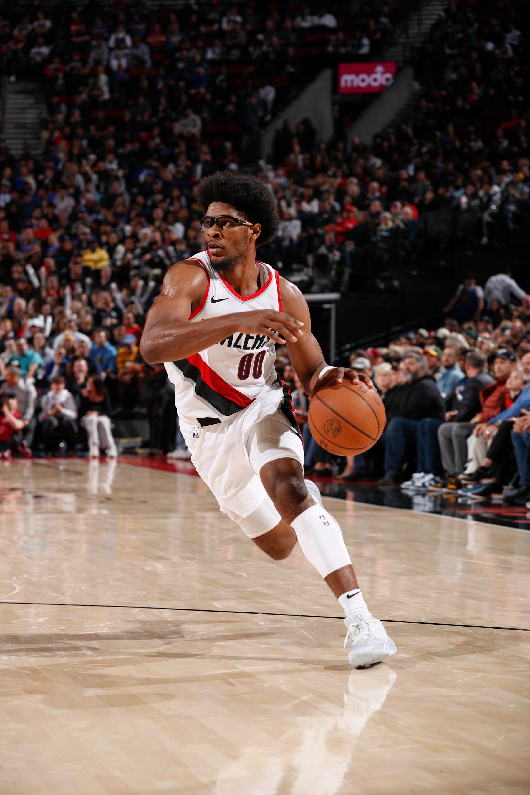 PORTLAND, OR - APRIL 11:  Scoot Henderson #00 of the Portland Trail Blazers goes to the basket during the game on April 11, 2024 at the Moda Center Arena in Portland, Oregon. NOTE TO USER: User expressly acknowledges and agrees that, by downloading and or using this photograph, user is consenting to the terms and conditions of the Getty Images License Agreement. Mandatory Copyright Notice: Copyright 2024 NBAE (Photo by Cameron Browne/NBAE via Getty Images)