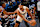 ORLANDO, FL - OCTOBER 18: Jalen Suggs #4 of the Orlando Magic handles the ball during the game against the Philadelphia 76ersduring a NBA preseason game on October 18, 2024 at Kia Center in Orlando, Florida. NOTE TO USER: User expressly acknowledges and agrees that, by downloading and or using this photograph, User is consenting to the terms and conditions of the Getty Images License Agreement. Mandatory Copyright Notice: Copyright 2024 NBAE (Photo by Fernando Medina/NBAE via Getty Images)