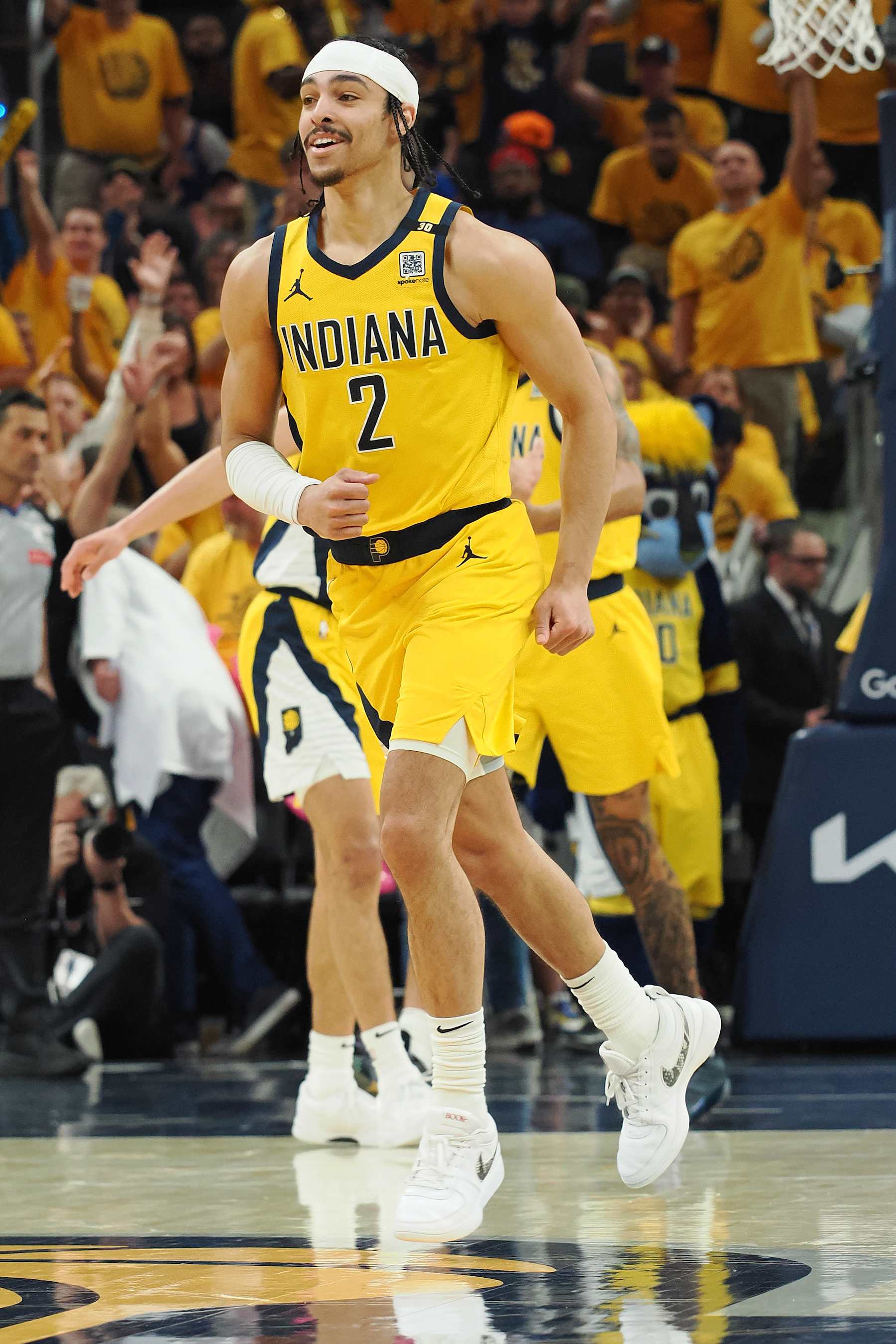INDIANAPOLIS, IN - MAY 17: Andrew Nembhard #2 of the Indiana Pacers celebrates during the game against the New York Knicks during Round 2 Game 6 of the 2024 NBA Playoffs on May 17, 2024 at Gainbridge Fieldhouse in Indianapolis, Indiana. NOTE TO USER: User expressly acknowledges and agrees that, by downloading and or using this Photograph, user is consenting to the terms and conditions of the Getty Images License Agreement. Mandatory Copyright Notice: Copyright 2024 NBAE (Photo by Ron Hoskins/NBAE via Getty Images)