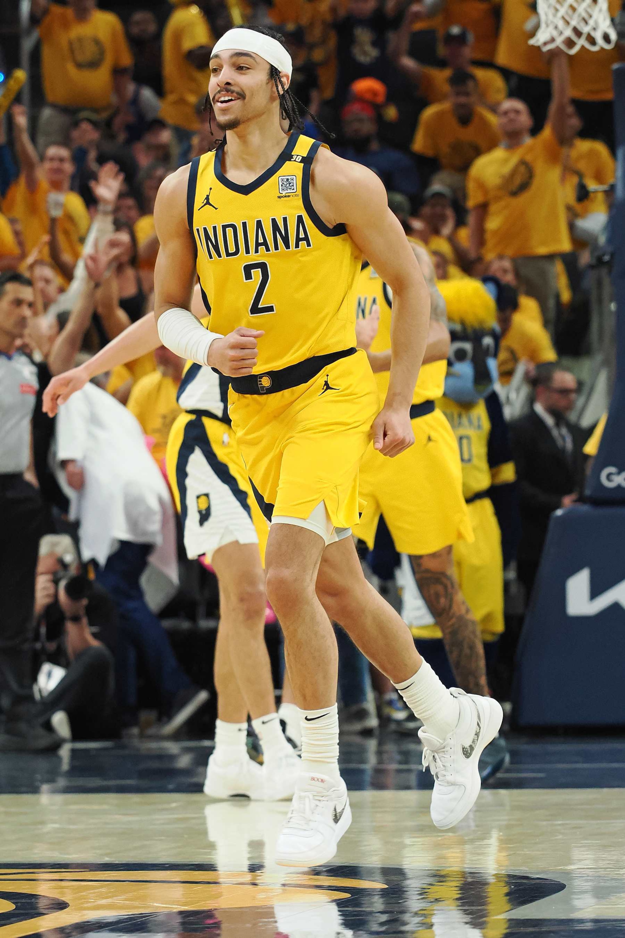 INDIANAPOLIS, IN - MAY 17: Andrew Nembhard #2 of the Indiana Pacers celebrates during the game against the New York Knicks during Round 2 Game 6 of the 2024 NBA Playoffs on May 17, 2024 at Gainbridge Fieldhouse in Indianapolis, Indiana. NOTE TO USER: User expressly acknowledges and agrees that, by downloading and or using this Photograph, user is consenting to the terms and conditions of the Getty Images License Agreement. Mandatory Copyright Notice: Copyright 2024 NBAE (Photo by Ron Hoskins/NBAE via Getty Images)