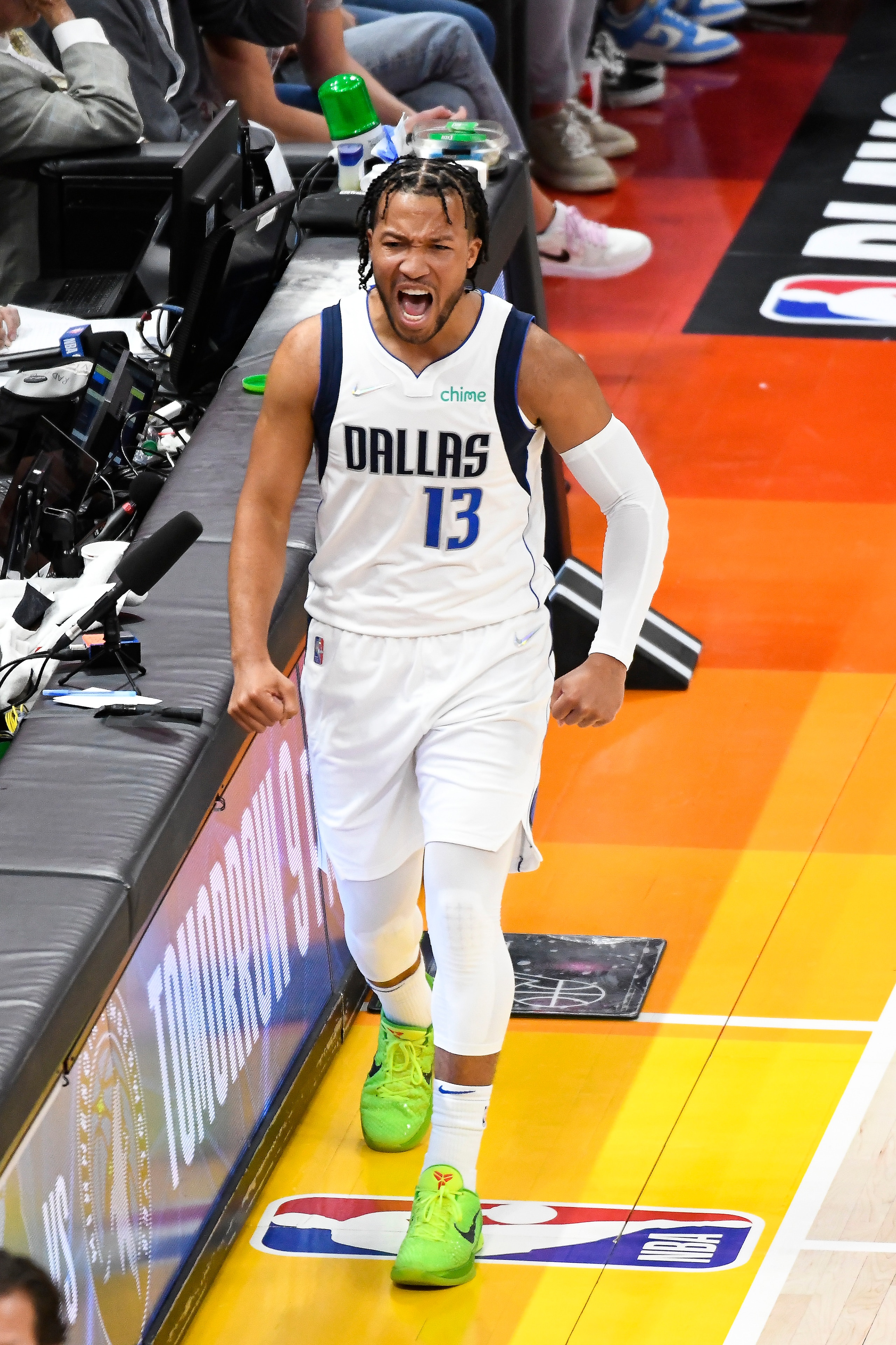 SALT LAKE CITY, UTAH - APRIL 28: Jalen Brunson #13 of the Dallas Mavericks celebrates a play during the second half of Game 6 of the Western Conference First Round Playoffs against the Utah Jazz at Vivint Smart Home Arena on April 28, 2022 in Salt Lake City, Utah. NOTE TO USER: User expressly acknowledges and agrees that, by downloading and/or using this Photograph, user is consenting to the terms and conditions of the Getty Images License Agreement. (Photo by Alex Goodlett/Getty Images)