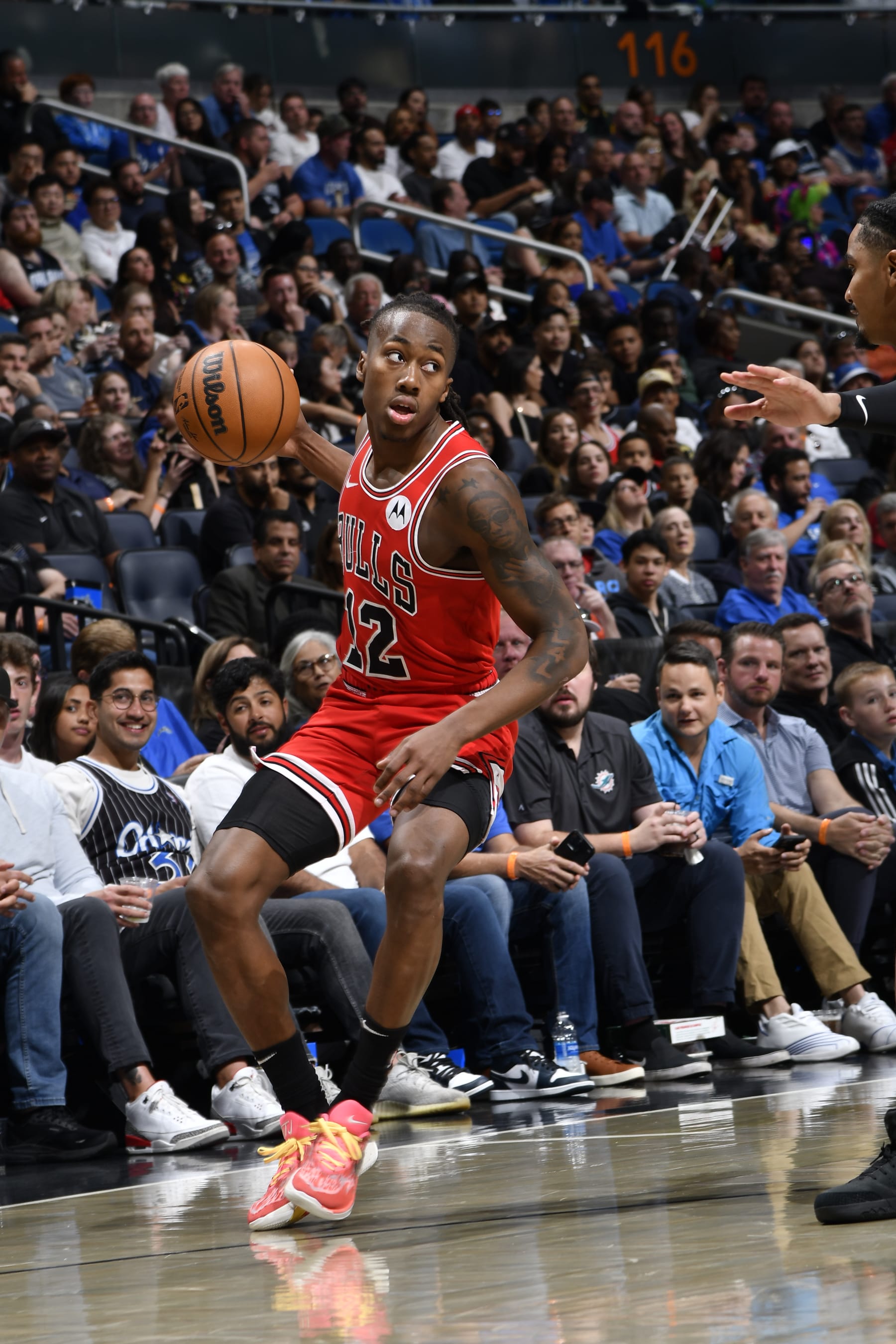 ORLANDO, FL - APRIL 7: Ayo Dosunmu #12 of the Chicago Bulls dribbles the ball during the game against the Orlando Magic on April 7, 2024 at the Kia Center in Orlando, Florida. NOTE TO USER: User expressly acknowledges and agrees that, by downloading and or using this photograph, User is consenting to the terms and conditions of the Getty Images License Agreement. Mandatory Copyright Notice: Copyright 2024 NBAE (Photo by Fernando Medina/NBAE via Getty Images)
