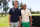 MIAMI BEACH, FLORIDA - MAY 04: IWC brand ambassador and seven-time World Champion quarterback Tom Brady and IWC brand ambassador and seven-time Formula One World Champion Lewis Hamilton during The Big Pilot Challenge, an entertaining charity golf challenge organized by IWC Schaffhausen at the Miami Beach Golf Club on May 4, 2022 in Miami Beach, Florida. (Photo by Alexander Tamargo/Getty Images for IWC Schaffhausen)