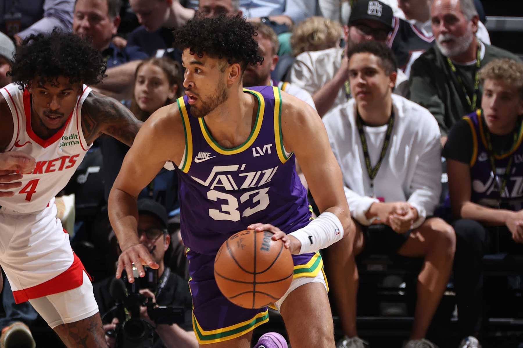 SALT LAKE CITY, UT - APRIL 11: Johnny Juzang #33 of the Utah Jazz handles the ball during the game against the Houston Rockets on April 11, 2024 at Delta Center in Salt Lake City, Utah. NOTE TO USER: User expressly acknowledges and agrees that, by downloading and or using this Photograph, User is consenting to the terms and conditions of the Getty Images License Agreement. Mandatory Copyright Notice: Copyright 2024 NBAE (Photo by Melissa Majchrzak/NBAE via Getty Images)