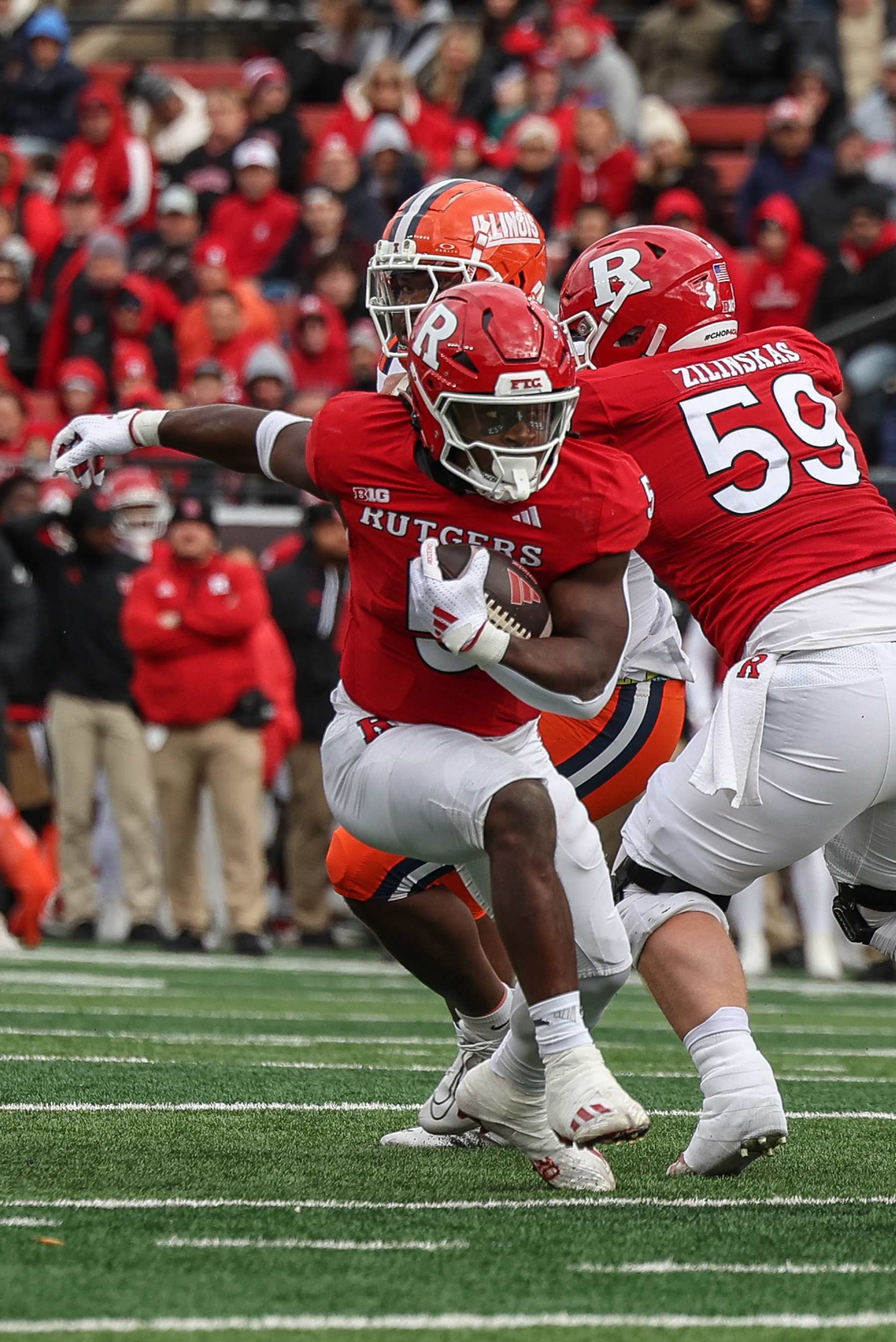 PISCATAWAY, NEW JERSEY - NOVEMBER 23: Kyle Monangai #5 of the Rutgers Scarlet Knights runs with the ball during the first half of their game against the Illinois Fighting Illini at SHI Stadium on November 23, 2024 in Piscataway, New Jersey. (Photo by Ed Mulholland/Getty Images)