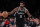 NEW YORK, NEW YORK - NOVEMBER 30: Kyrie Irving #11 of the Brooklyn Nets drives against the Washington Wizards during their game at Barclays Center on November 30, 2022 in New York City. User expressly acknowledges and agrees that, by downloading and or using this photograph, User is consenting to the terms and conditions of the Getty Images License Agreement. (Photo by Al Bello/Getty Images)