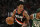 PORTLAND, OREGON - MARCH 17: Anfernee Simons #1 of the Portland Trail Blazers drives past Marcus Smart #36 of the Boston Celtics during the second quarter at the Moda Center on March 17, 2023 in Portland, Oregon. NOTE TO USER: User expressly acknowledges and agrees that, by downloading and or using this photograph, User is consenting to the terms and conditions of the Getty Images License Agreement. (Photo by Alika Jenner/Getty Images)