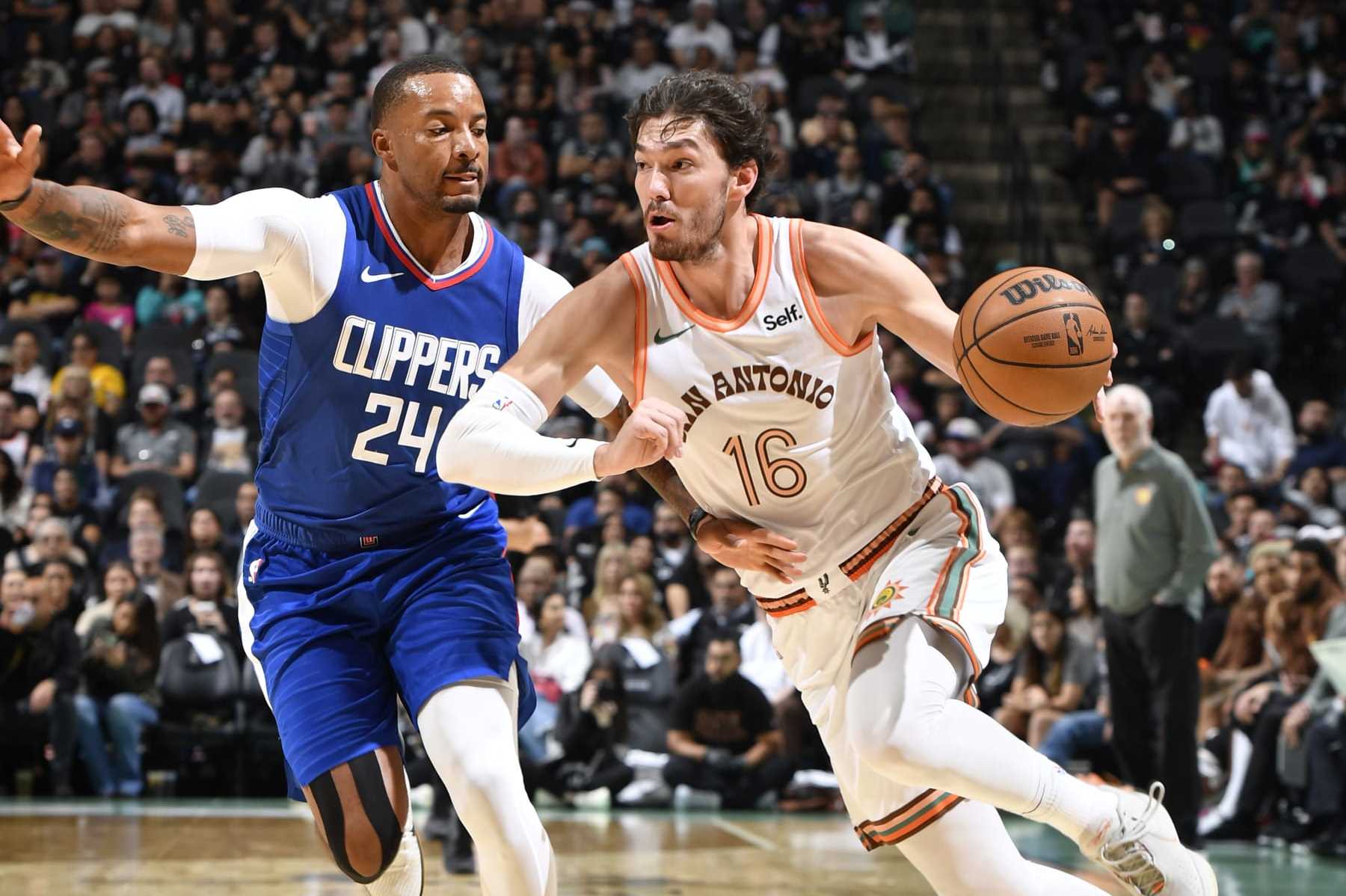 SAN ANTONIO, TX - NOVEMBER 20: Cedi Osman #16 of the San Antonio Spurs drives to the basket during the game against the LA Clippers on November 20, 2023 at the Frost Bank Center in San Antonio, Texas. NOTE TO USER: User expressly acknowledges and agrees that, by downloading and or using this photograph, user is consenting to the terms and conditions of the Getty Images License Agreement. Mandatory Copyright Notice: Copyright 2023 NBAE (Photos by Logan Riely/NBAE via Getty Images)