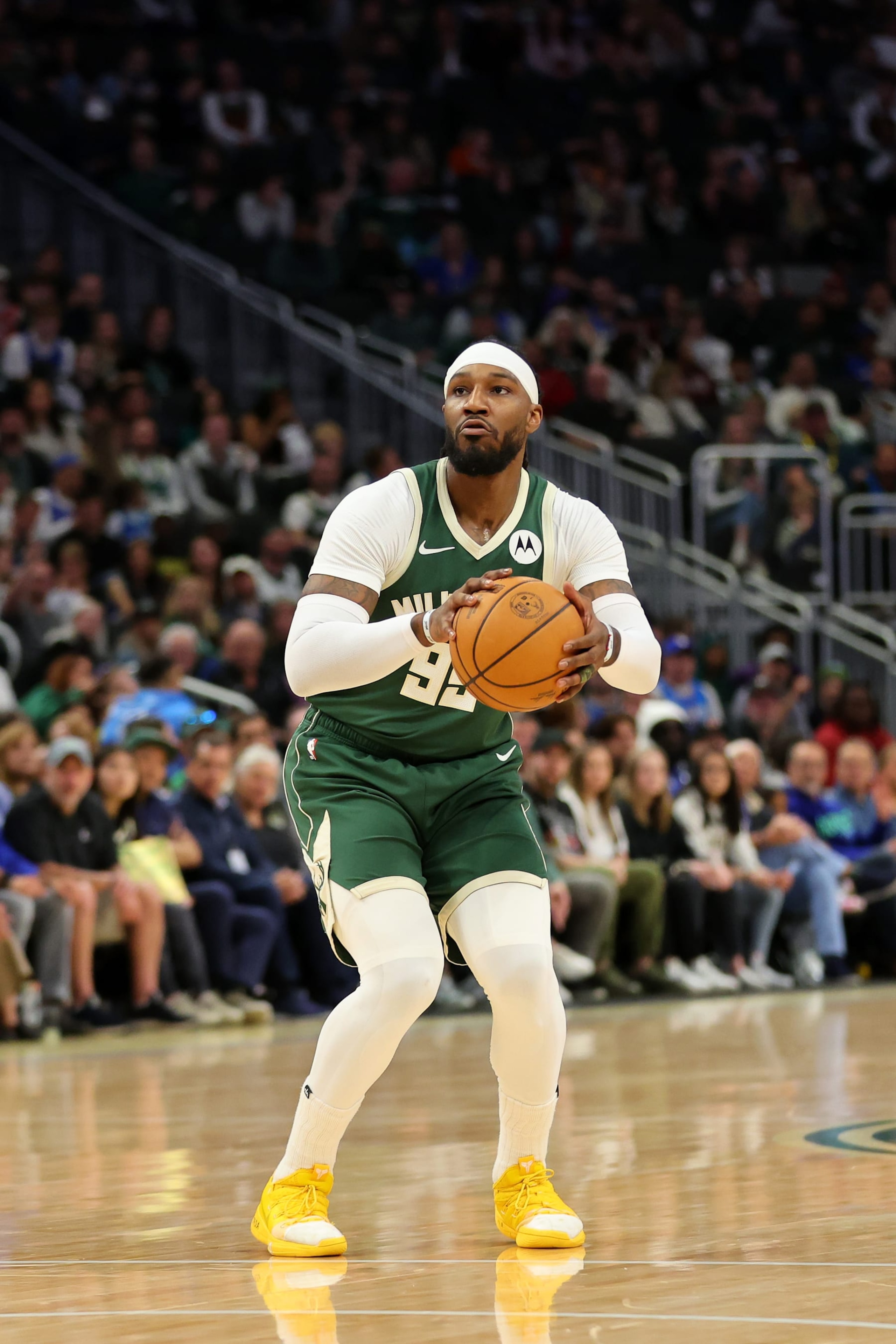 MILWAUKEE, WISCONSIN - APRIL 10: Jae Crowder #99 of the Milwaukee Bucks takes a shot during a game against the Orlando Magic at Fiserv Forum on April 10, 2024 in Milwaukee, Wisconsin. NOTE TO USER: User expressly acknowledges and agrees that, by downloading and or using this photograph, User is consenting to the terms and conditions of the Getty Images License Agreement. (Photo by Stacy Revere/Getty Images)