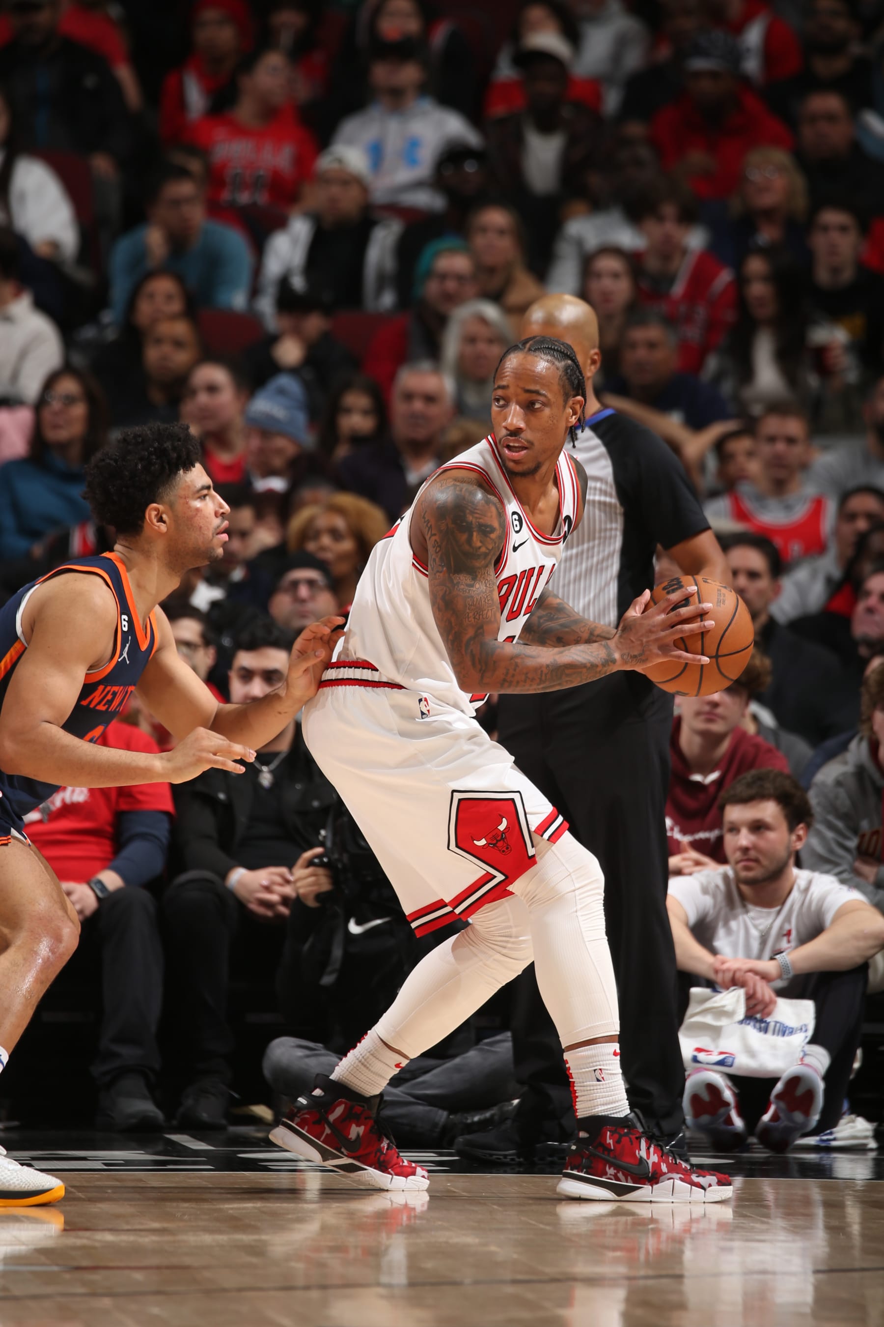 CHICAGO, IL - DECEMBER 14: DeMar DeRozan #11 of the Chicago Bulls looks to pass the ball during the game against the New York Knicks on December 14, 2022 at United Center in Chicago, Illinois. NOTE TO USER: User expressly acknowledges and agrees that, by downloading and or using this photograph, User is consenting to the terms and conditions of the Getty Images License Agreement. Mandatory Copyright Notice: Copyright 2022 NBAE (Photo by Gary Dineen/NBAE via Getty Images)