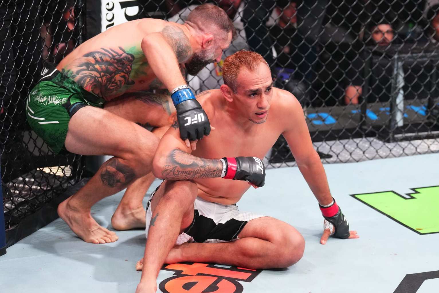 ABU DHABI, UNITED ARAB EMIRATES - AUGUST 03: (L-R) Michael Chiesa submits Tony Ferguson in a welterweight fight during the UFC Fight Night event at Etihad Arena on August 03, 2024 in Abu Dhabi, United Arab Emirates. (Photo by Josh Hedges/Zuffa LLC via Getty Images)