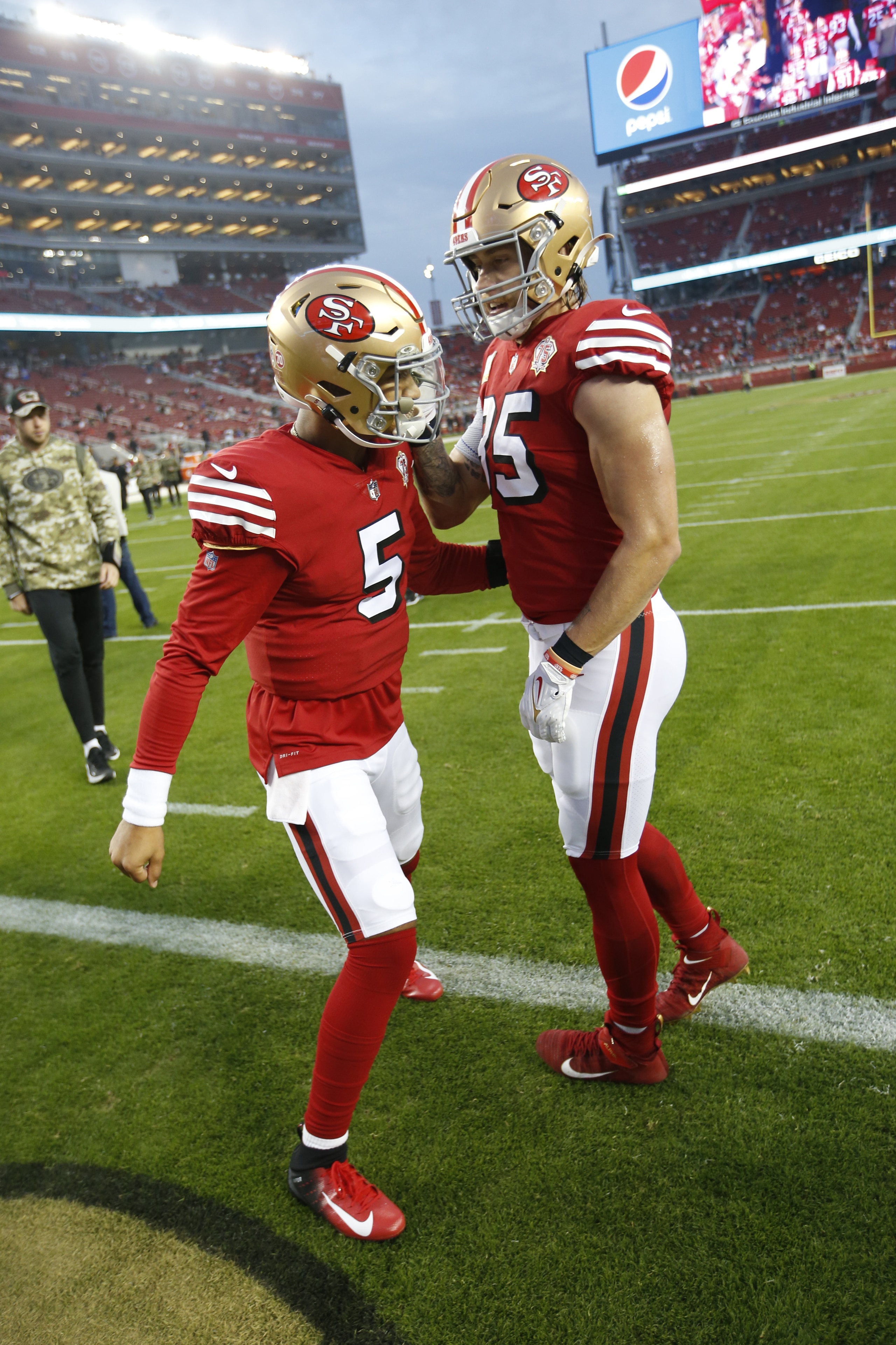 SANTA CLARA, CA - NOVEMBER 15: Trey Lance #5 and George Kittle #85 of the San Francisco 49ers on the field before the game against the Los Angeles Rams at Levi's Stadium on November 15, 2021 in Santa Clara, California. The 49ers defeated the Rams 31-10. (Photo by Michael Zagaris/San Francisco 49ers/Getty Images) SANTA CLARA, CA - NOVEMBER 15: Trey Lance #5 and George Kittle #85 of the San Francisco 49ers on the field before the game against the Los Angeles Rams at Levi's Stadium on November 15, 2021 in Santa Clara, California. The 49ers defeated the Rams 31-10. (Photo by Michael Zagaris/San Francisco 49ers/Getty Images)