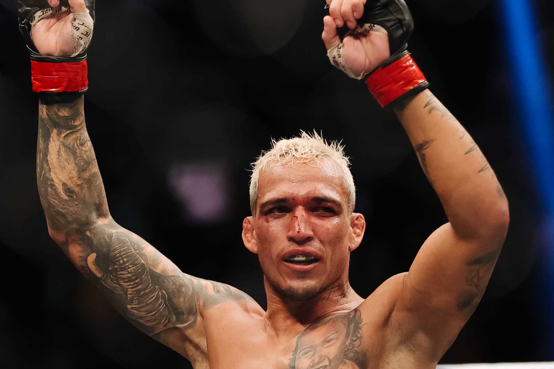 LAS VEGAS, NEVADA - DECEMBER 11: Charles Oliveira of Brazil reacts following his lightweight title fight against Dustin Poirier during the UFC 269 event at T-Mobile Arena on December 11, 2021 in Las Vegas, Nevada. (Photo by Carmen Mandato/Getty Images)