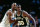 CHARLOTTE, NC - DECEMBER 1: David Robinson #50 of the San Antonio Spurs battles for position against the Charlotte Hornets on December 1, 1993 at Charlotte Coliseum in Charlotte, NC. NOTE TO USER: User expressly acknowledges and agrees that, by downloading and/or using this photograph, user is consenting to the terms and conditions of the Getty Images License Agreement.  Mandatory Copyright Notice: Copyright 1994 NBAE (Photo by Gregg Forwerck/NBAE via Getty Images)