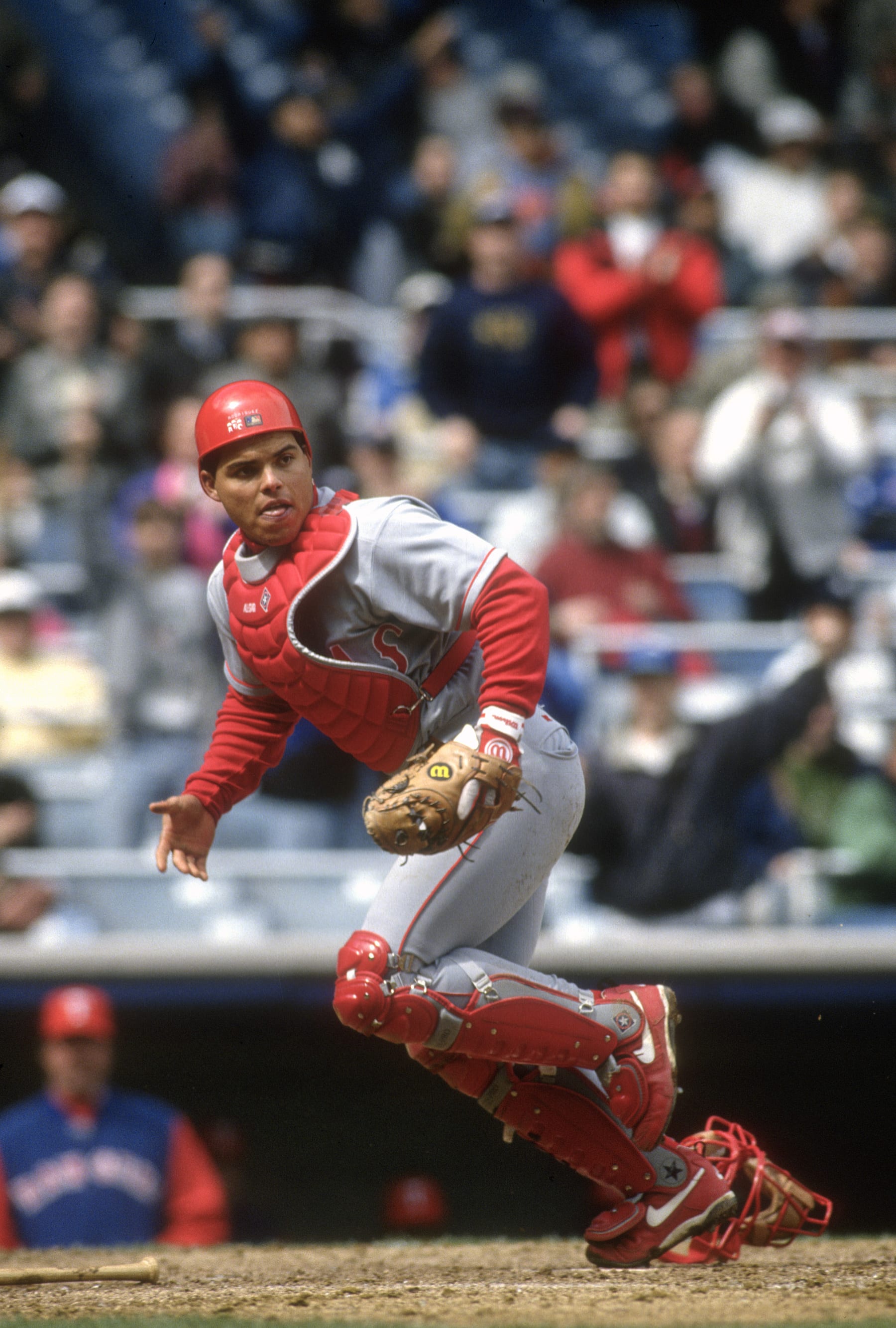 NEW YORK - CIRCA 1994: Catcher Ivan Rodriguez #7 of the Texas Rangers in action against the New York Yankees during an Major League Baseball game circa 1994 at Yankee Stadium in Bronx borough of New York City. Rodriguez played for the Rangers from 1991-2002 and in 2009. (Photo by Focus on Sport/Getty Images)