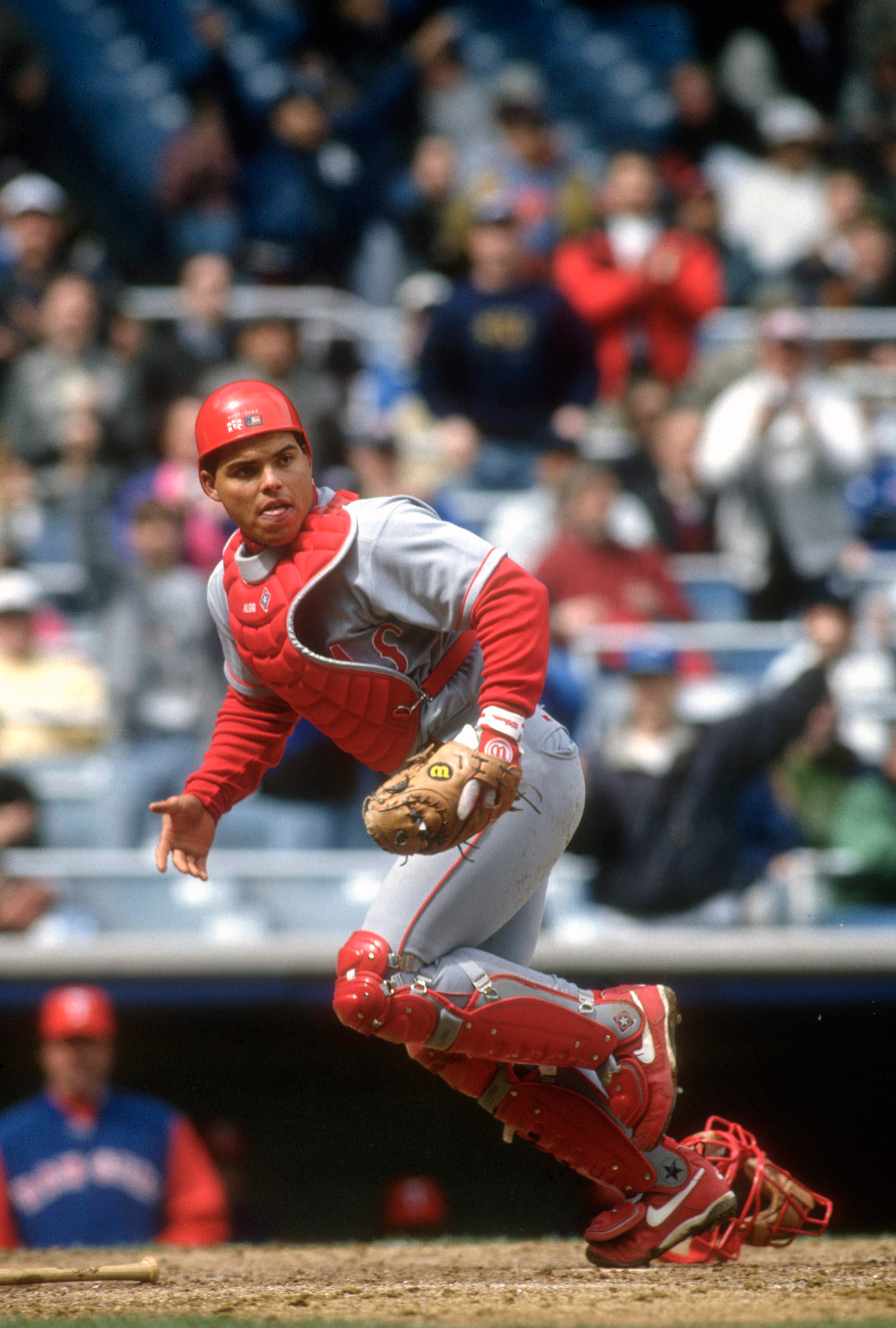 NEW YORK - CIRCA 1994: Catcher Ivan Rodriguez #7 of the Texas Rangers in action against the New York Yankees during an Major League Baseball game circa 1994 at Yankee Stadium in Bronx borough of New York City. Rodriguez played for the Rangers from 1991-2002 and in 2009. (Photo by Focus on Sport/Getty Images)
