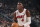 MILWAUKEE, WI - APRIL 19:  Victor Oladipo #4 of the Miami Heat shoots a free throw during the game during round one game two of the 2023 NBA Playoffs on April 19, 2023 at the Fiserv Forum Center in Milwaukee, Wisconsin. NOTE TO USER: User expressly acknowledges and agrees that, by downloading and or using this Photograph, user is consenting to the terms and conditions of the Getty Images License Agreement. Mandatory Copyright Notice: Copyright 2023 NBAE (Photo by Gary Dineen/NBAE via Getty Images).
