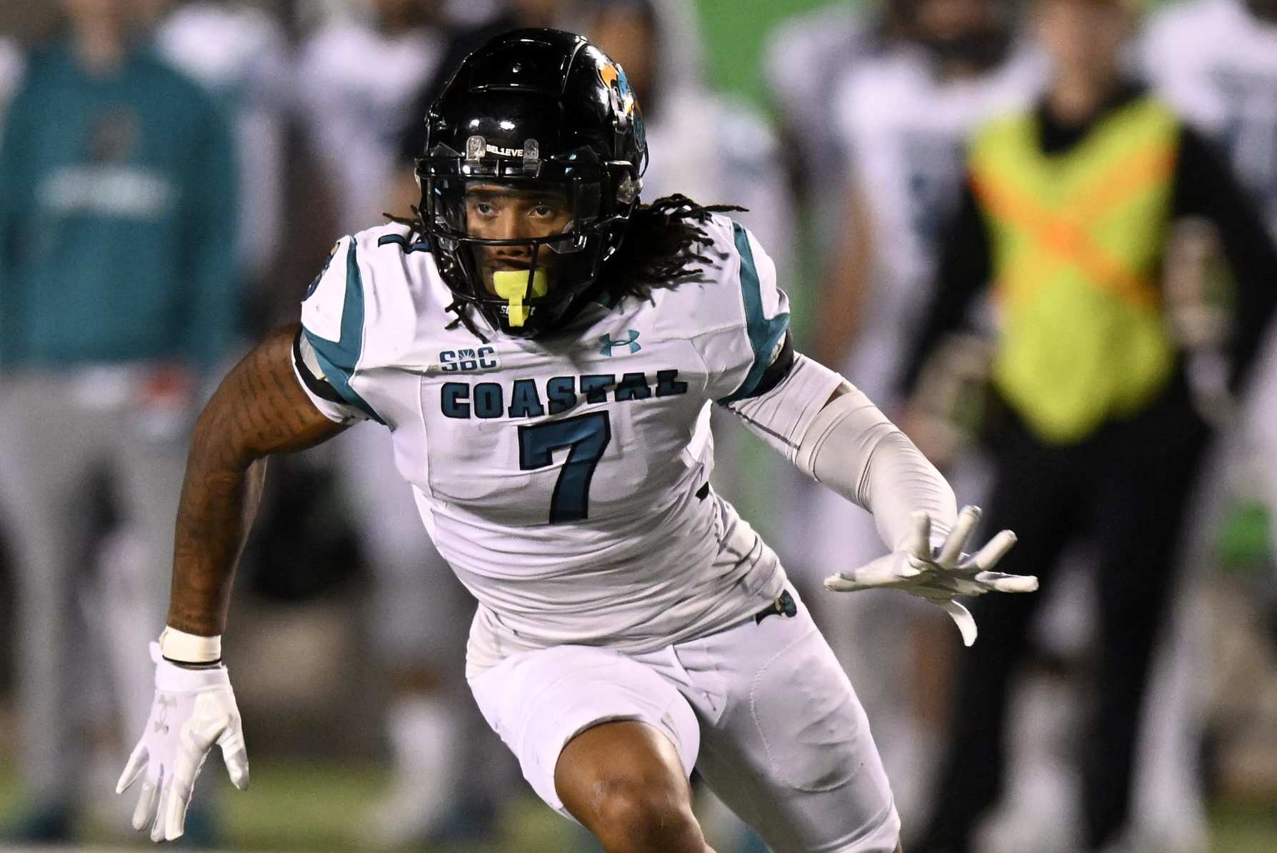 HUNTINGTON, WEST VIRGINIA - OCTOBER 29: Lance Boykin #7 of the Coastal Carolina Chanticleers defends against the Marshall Thundering Herd at Joan C. Edwards Stadium on October 29, 2022 in Huntington, West Virginia. (Photo by G Fiume/Getty Images)