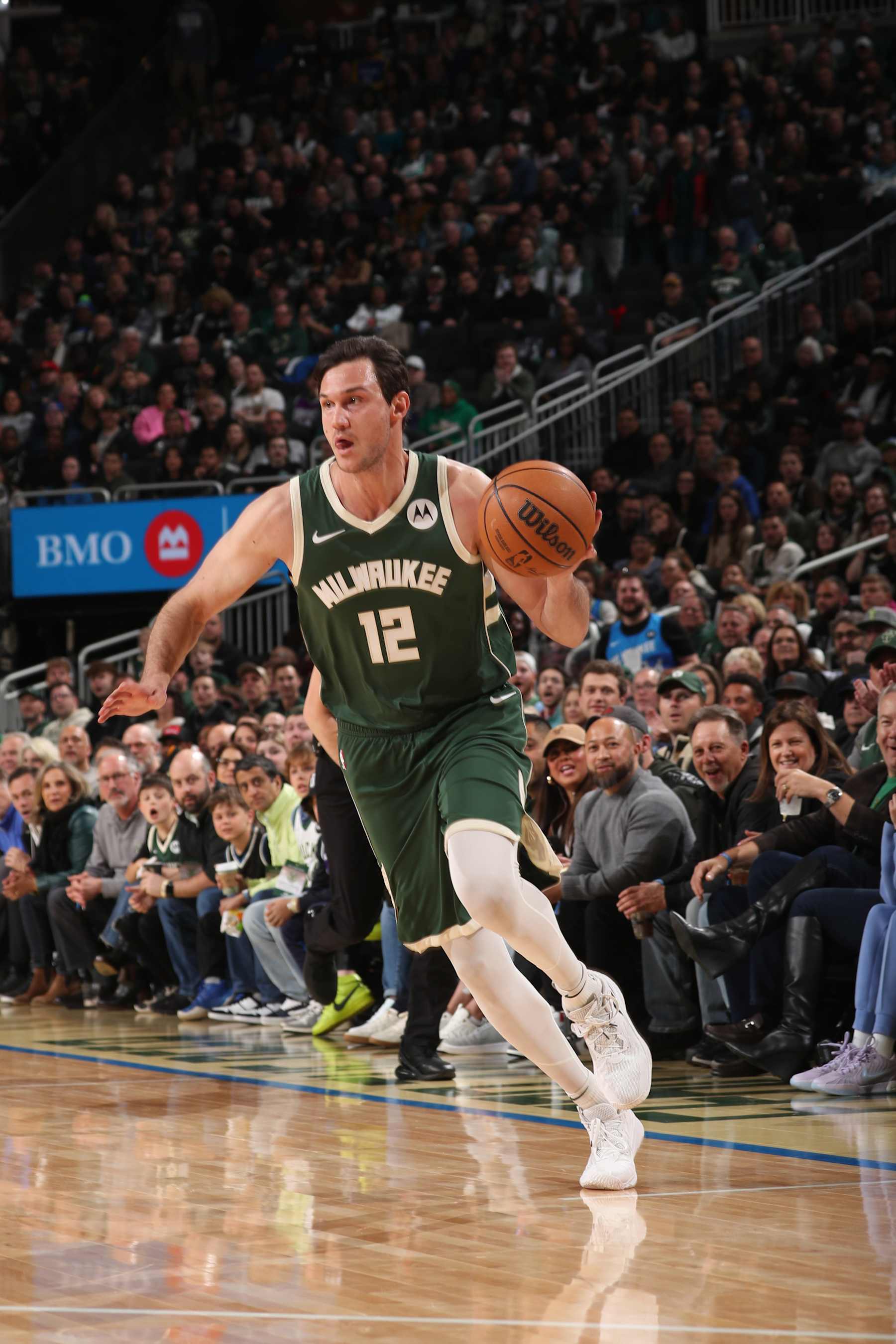 MILWAUKEE, WI - APRIL 3:  /Danilo Gallinari #12 of the Milwaukee Bucks dribbles the ball during the game against the Memphis Grizzlies on April 3, 2024 at the Fiserv Forum Center in Milwaukee, Wisconsin. NOTE TO USER: User expressly acknowledges and agrees that, by downloading and or using this Photograph, user is consenting to the terms and conditions of the Getty Images License Agreement. Mandatory Copyright Notice: Copyright 2024 NBAE (Photo by Gary Dineen/NBAE via Getty Images).