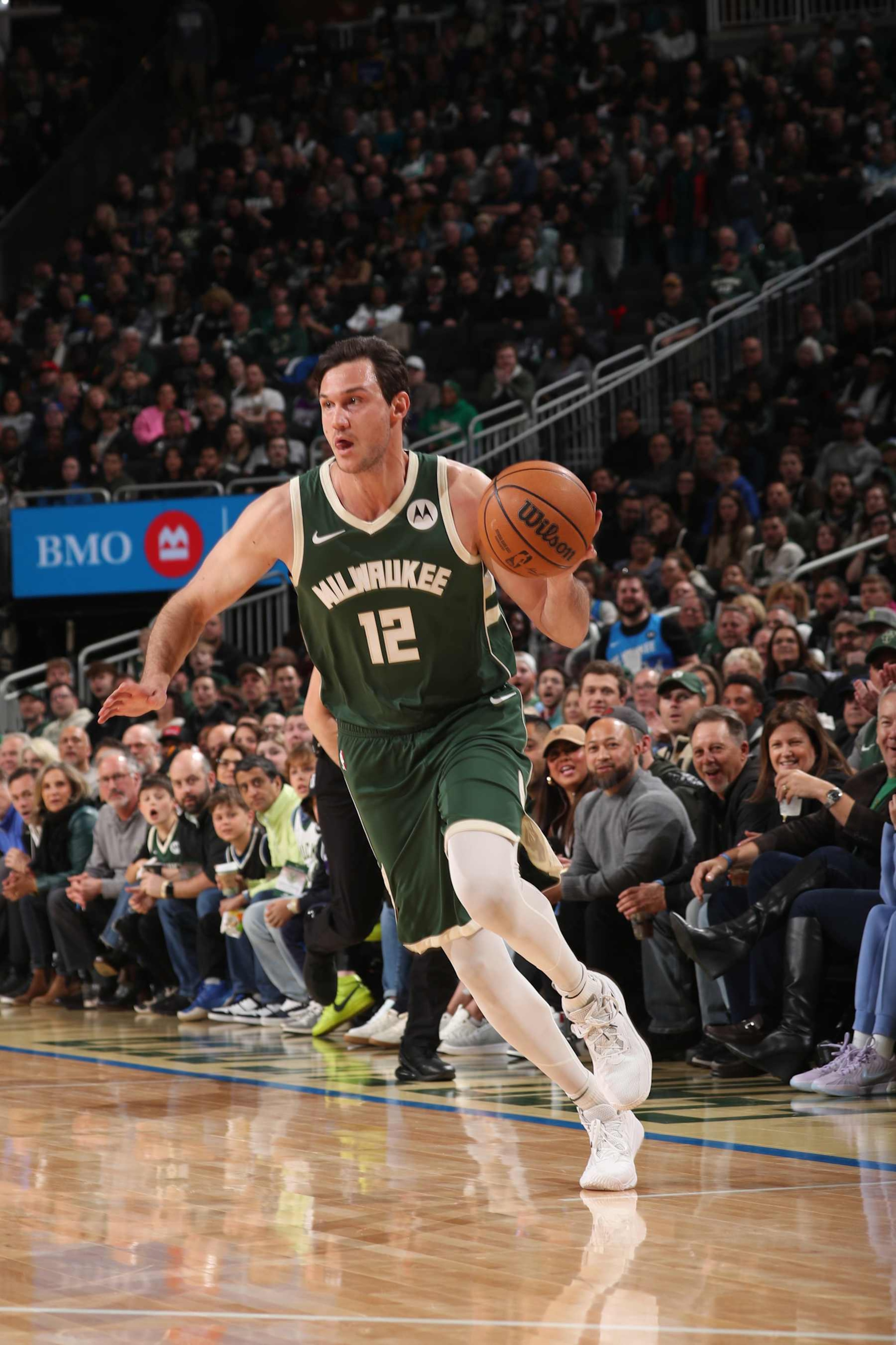MILWAUKEE, WI - APRIL 3:  /Danilo Gallinari #12 of the Milwaukee Bucks dribbles the ball during the game against the Memphis Grizzlies on April 3, 2024 at the Fiserv Forum Center in Milwaukee, Wisconsin. NOTE TO USER: User expressly acknowledges and agrees that, by downloading and or using this Photograph, user is consenting to the terms and conditions of the Getty Images License Agreement. Mandatory Copyright Notice: Copyright 2024 NBAE (Photo by Gary Dineen/NBAE via Getty Images).