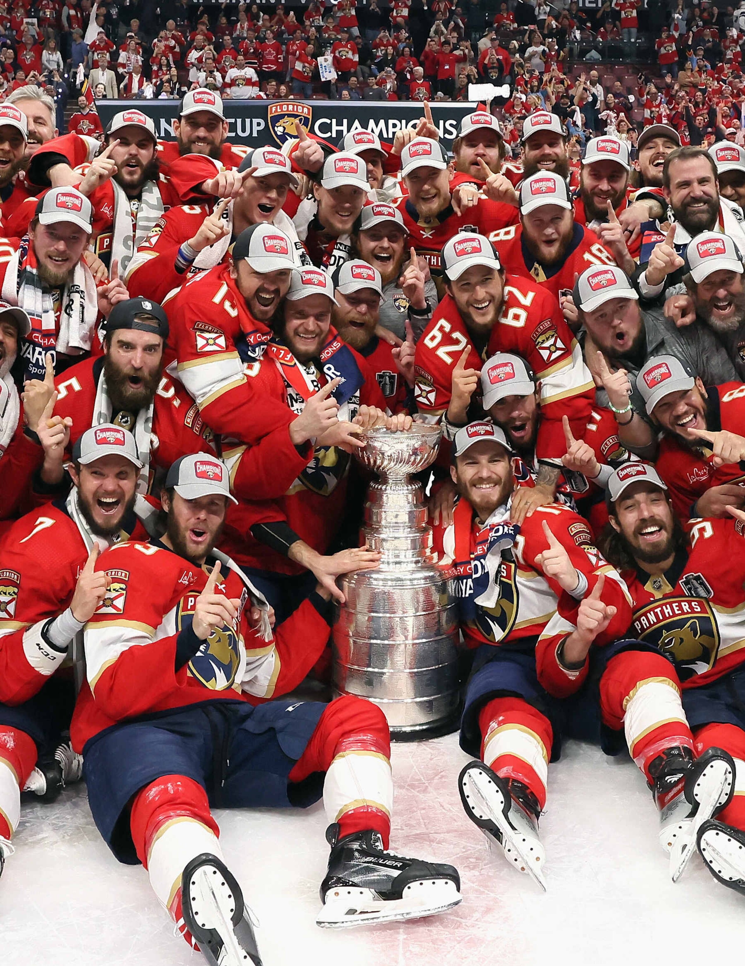 SUNRISE, FLORIDA - JUNE 24: The Florida Panthers celebrate with the Stanley Cup following a 2-1 victory over the Edmonton Oilers in Game Seven of the 2024 NHL Stanley Cup Final at Amerant Bank Arena on June 24, 2024 in Sunrise, Florida. (Photo by Bruce Bennett/Getty Images)