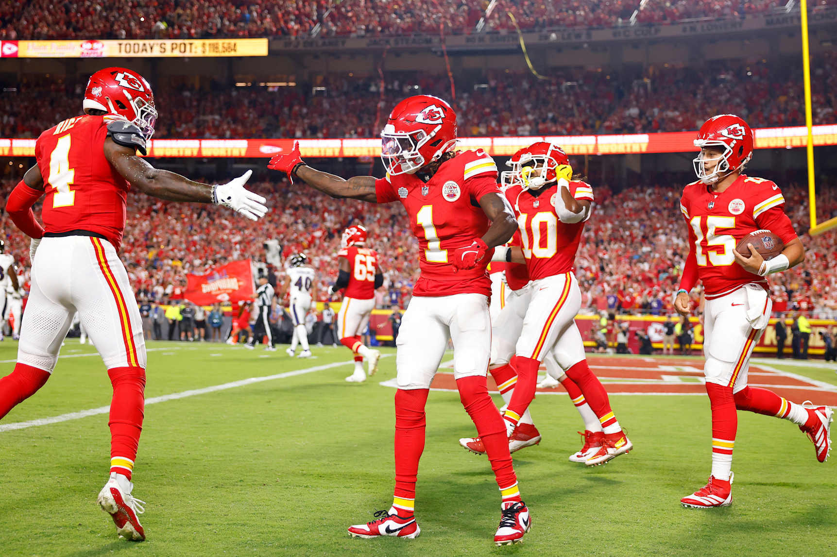 KANSAS CITY, MISSOURI - SEPTEMBER 05: Xavier Worthy #1 of the Kansas City Chiefs celebrates his touchdown with teammate Rashee Rice #4 as they play against the Baltimore Ravens during the first quarter at GEHA Field at Arrowhead Stadium on September 05, 2024 in Kansas City, Missouri. (Photo by David Eulitt/Getty Images)