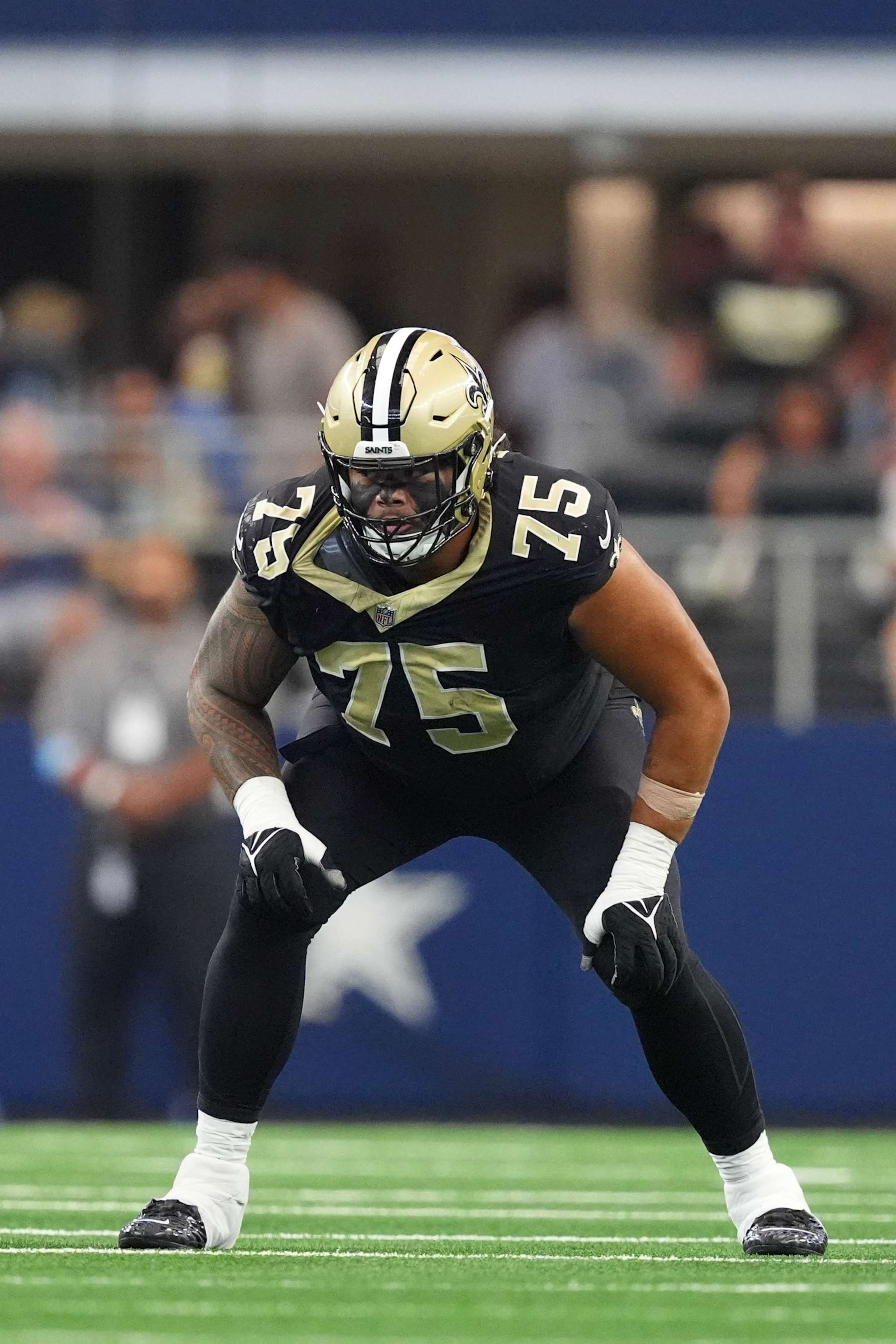 ARLINGTON, TEXAS - SEPTEMBER 15: Taliese Fuaga #75 of the New Orleans Saints in action during the second half against the Dallas Cowboys at AT&T Stadium on September 15, 2024 in Arlington, Texas. (Photo by Sam Hodde/Getty Images) ARLINGTON, TEXAS - SEPTEMBER 15: Taliese Fuaga #75 of the New Orleans Saints in action during the second half against the Dallas Cowboys at AT&T Stadium on September 15, 2024 in Arlington, Texas. (Photo by Sam Hodde/Getty Images)