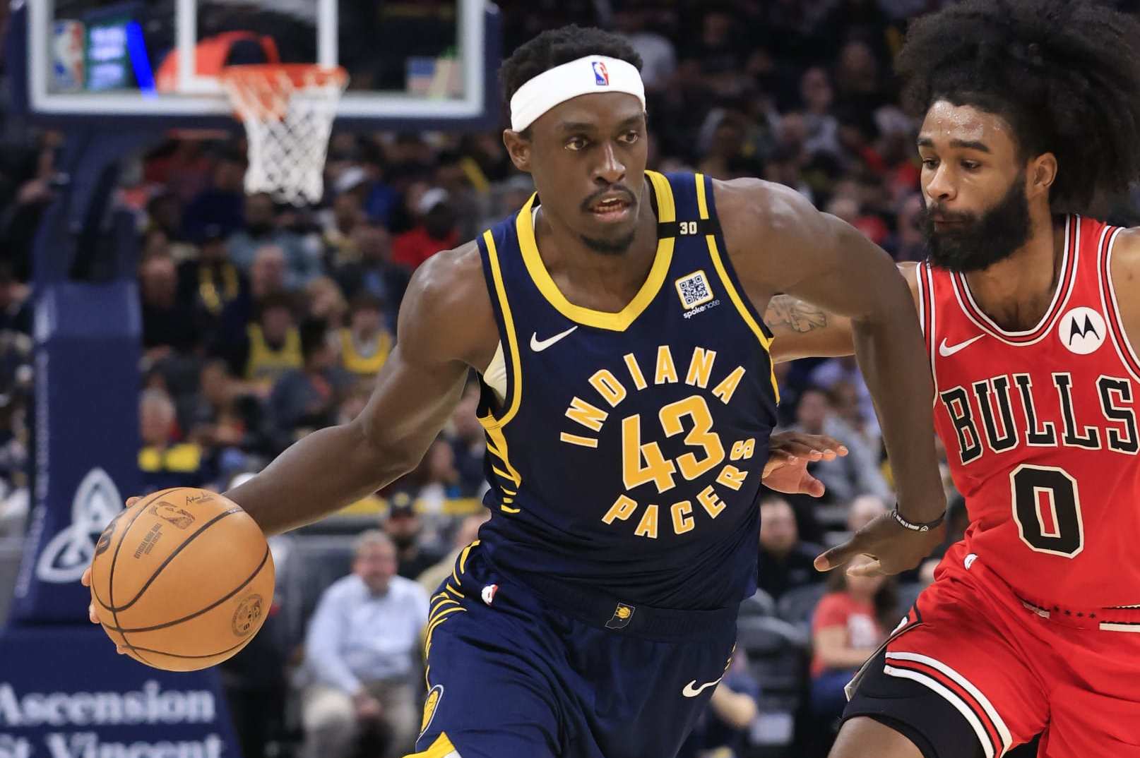 INDIANAPOLIS, INDIANA - MARCH 13: Pascal Siakam #43 of the Indiana Pacers drives to the basket against Coby White #0 of the Chicago Bulls at Gainbridge Fieldhouse on March 13, 2024 in Indianapolis, Indiana. NOTE TO USER: User expressly acknowledges and agrees that, by downloading and or using this photograph, User is consenting to the terms and conditions of the Getty Images License Agreement. (Photo by Justin Casterline/Getty Images)
