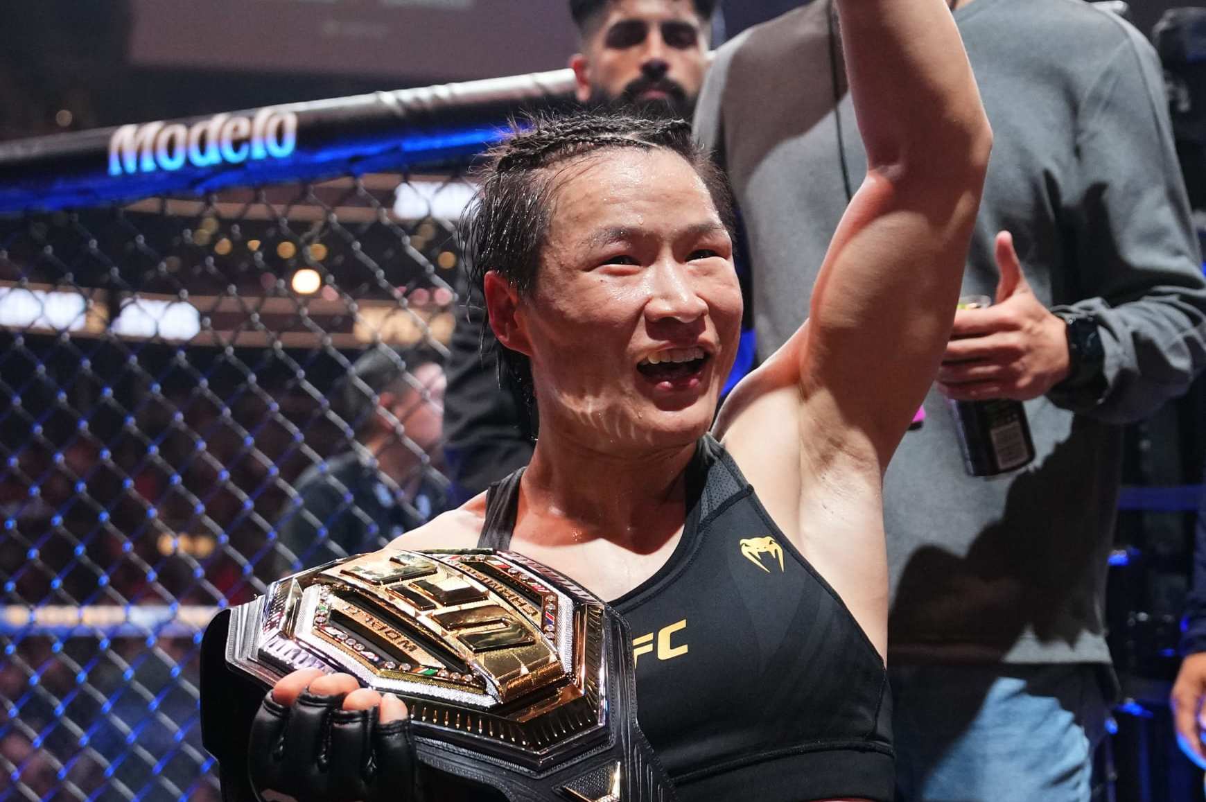 Zhang Weili of China reacts after her victory over Amanda Lemos