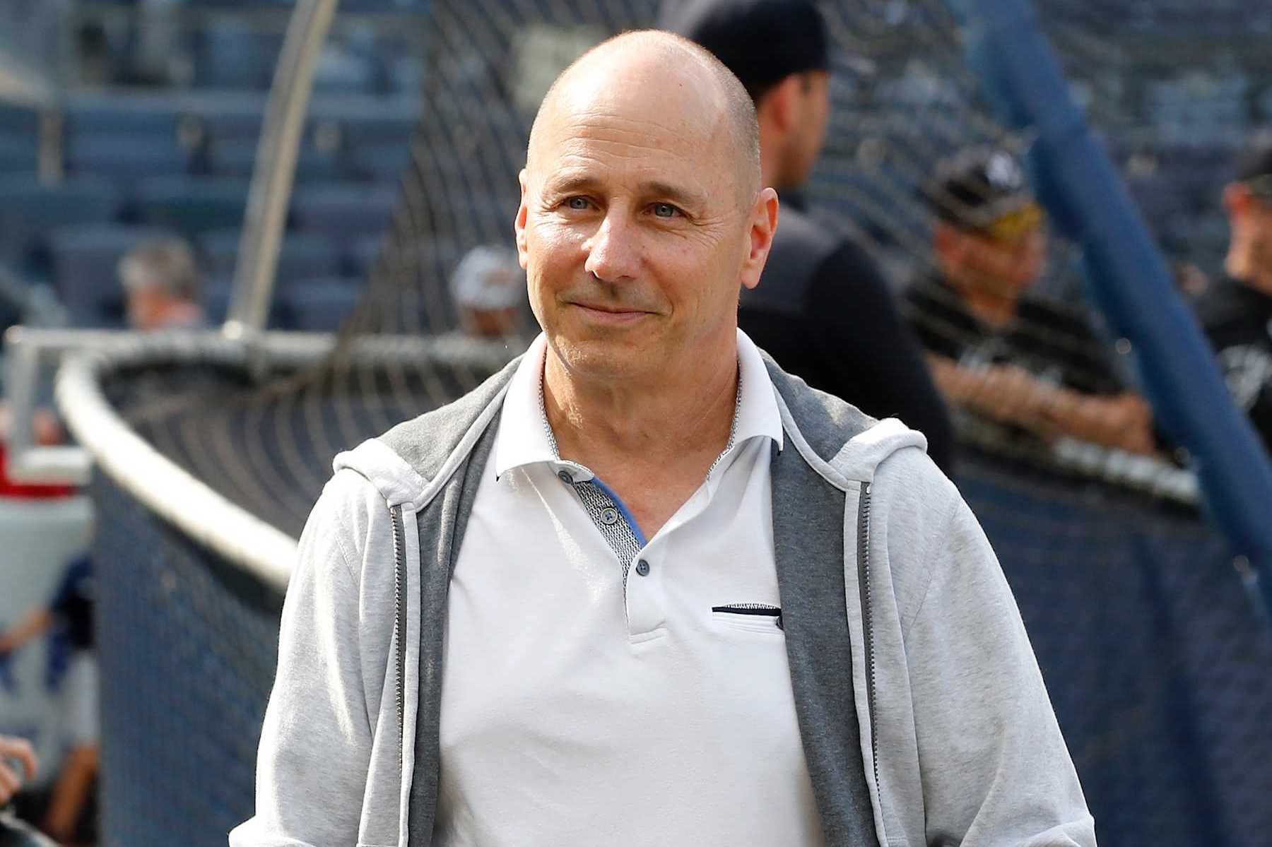 NEW YORK, NEW YORK - JUNE 20:  (NEW YORK DAILIES OUT)  New York Yankees general manager Brian Cashman looks on during batting practice before a game between the Yankees and the Seattle Mariners at Yankee Stadium on June 20, 2023 in the Bronx borough of New York City. The Yankees defeated the Mariners 3-1. (Photo by Jim McIsaac/Getty Images)