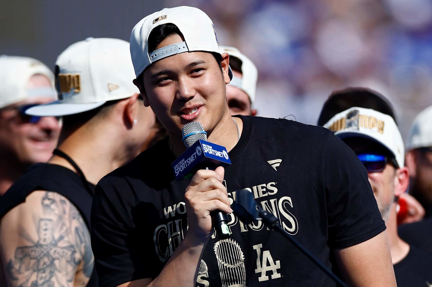 LOS ANGELES, CALIFORNIA - NOVEMBER 01: Shohei Ohtani #17 of the Los Angeles Dodgers speaks during the 2024 World Series Celebration Show at Dodger Stadium on November 01, 2024 in Los Angeles, California. (Photo by Ronald Martinez/Getty Images)