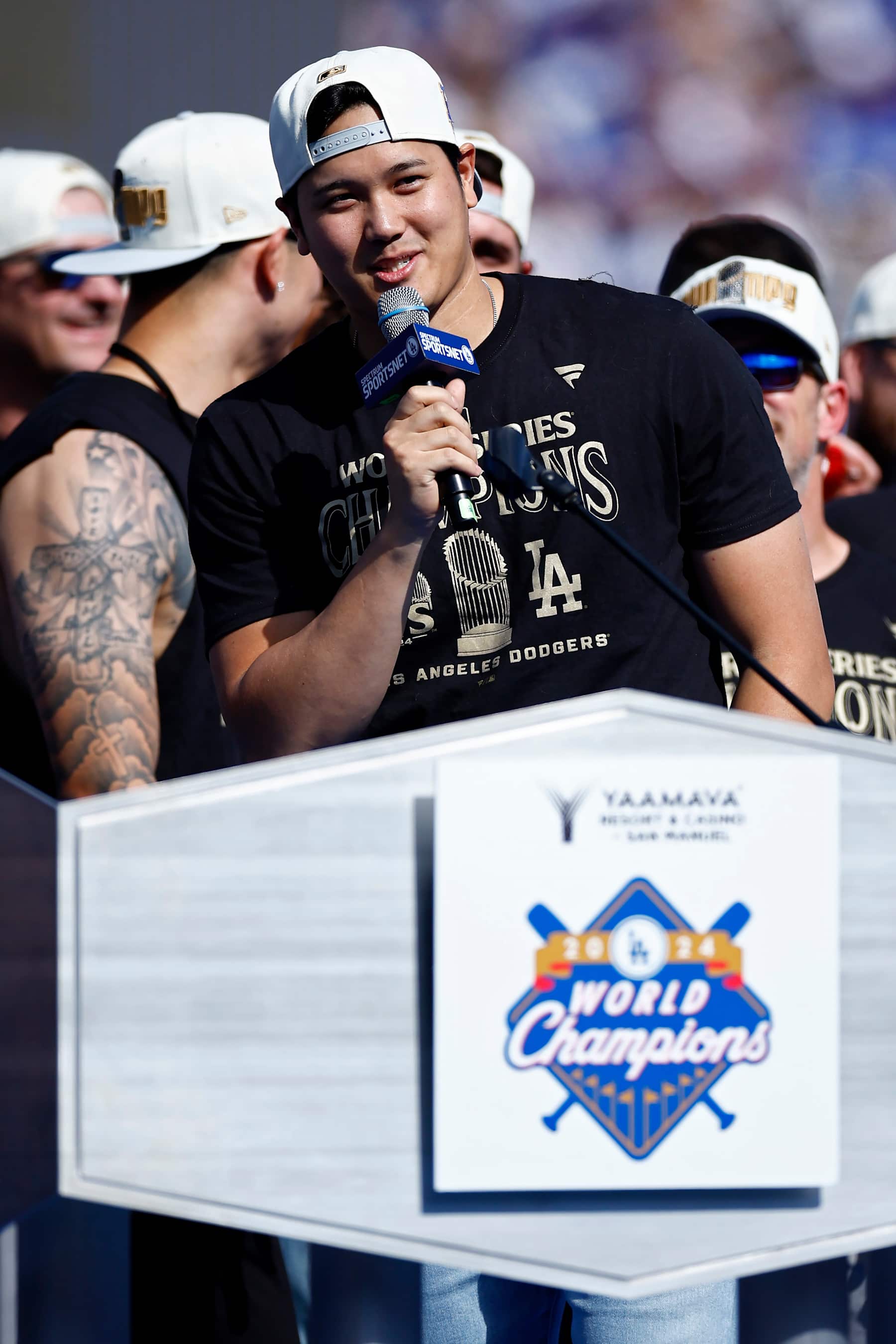 LOS ANGELES, CALIFORNIA - NOVEMBER 01: Shohei Ohtani #17 of the Los Angeles Dodgers speaks during the 2024 World Series Celebration Show at Dodger Stadium on November 01, 2024 in Los Angeles, California. (Photo by Ronald Martinez/Getty Images)