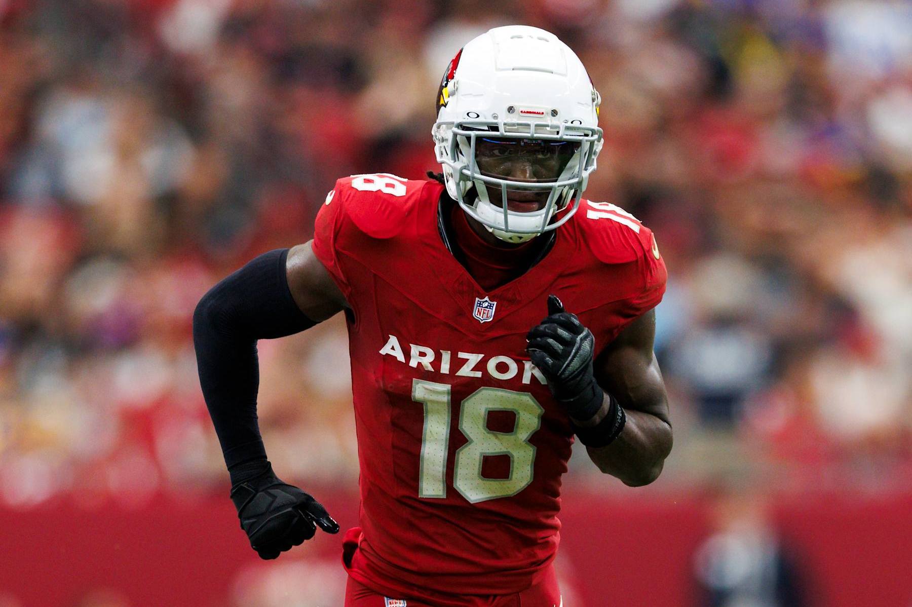 GLENDALE, ARIZONA - SEPTEMBER 15: Marvin Harrison Jr. #18 of the Arizona Cardinals runs a route during a game against the Los Angeles Rams at State Farm Stadium on September 15, 2024 in Glendale, Arizona. (Photo by Ric Tapia/Getty Images)