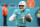 Miami Dolphins quarterback Tua Tagovailoa (1) runs with the ball during an NFL football game against the Green Bay Packers, Sunday, Dec. 25, 2022, in Miami Gardens, Fla. (AP Photo/Doug Murray)