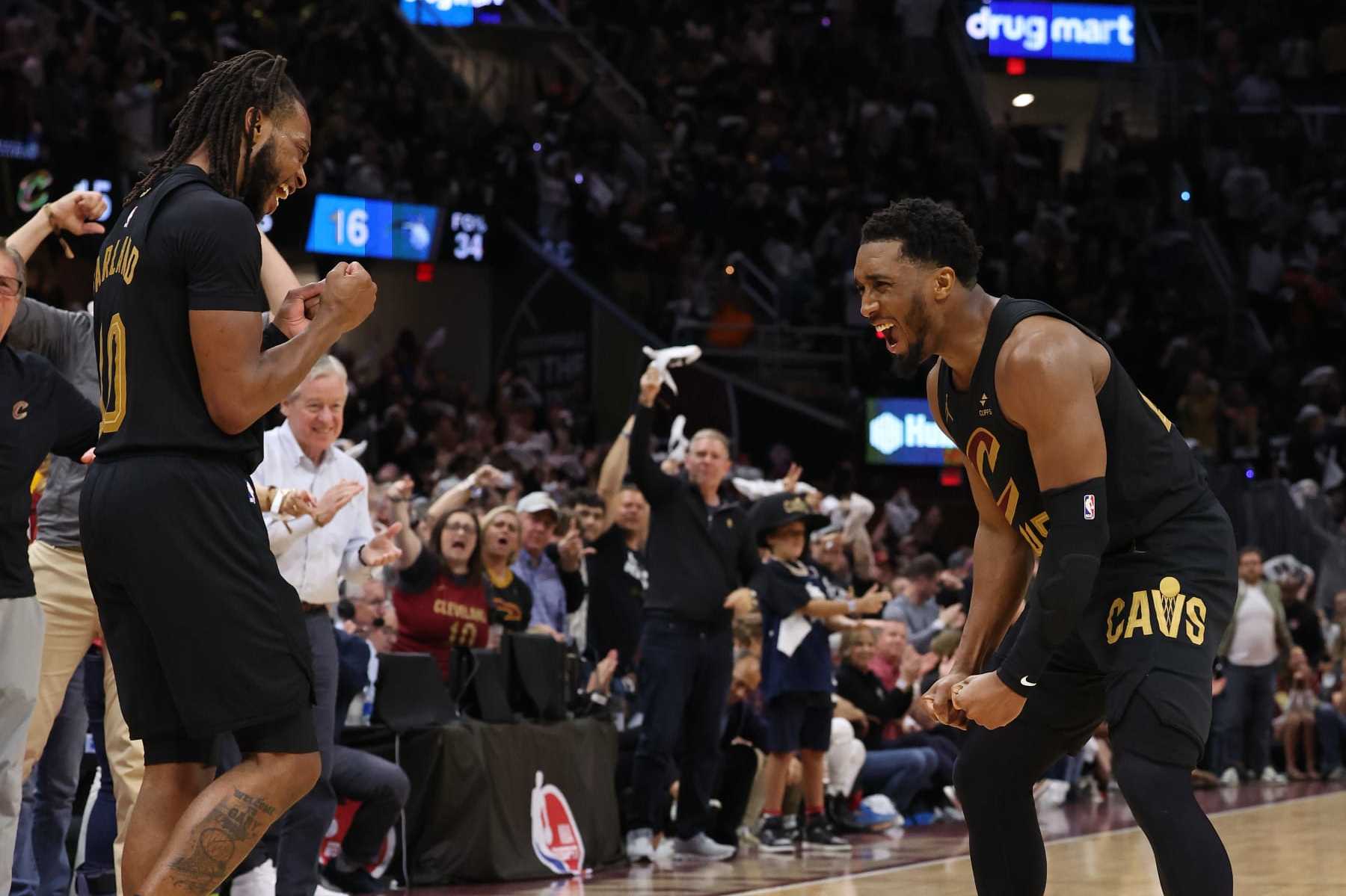 CLEVELAND, OH - MAY 5: Donovan Mitchell #45 and Darius Garland #10 of the Cleveland Cavaliers celebrates during the game  against the Orlando Magic during Round 1 Game 7 of the 2024 NBA Playoffs on May 5, 2024 at Rocket Mortgage FieldHouse in Cleveland, Ohio. NOTE TO USER: User expressly acknowledges and agrees that, by downloading and/or using this Photograph, user is consenting to the terms and conditions of the Getty Images License Agreement. Mandatory Copyright Notice: Copyright 2024 NBAE (Photo by Lauren Leigh Bacho/NBAE via Getty Images)