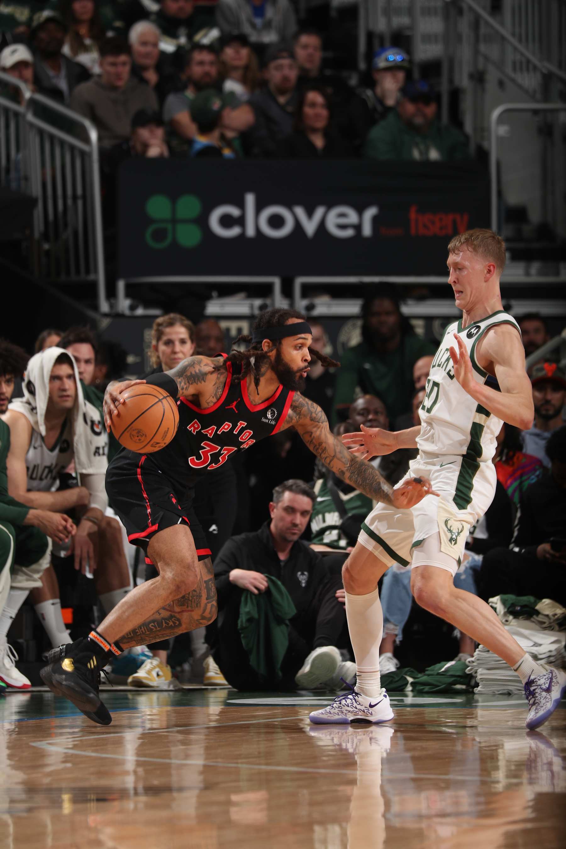 MILWAUKEE, WI - APRIL 5: Gary Trent Jr. #33 of the Toronto Raptors handles the ball during the game against the Milwaukee Bucks on April 5, 2024 at the Fiserv Forum Center in Milwaukee, Wisconsin. NOTE TO USER: User expressly acknowledges and agrees that, by downloading and or using this Photograph, user is consenting to the terms and conditions of the Getty Images License Agreement. Mandatory Copyright Notice: Copyright 2024 NBAE (Photo by Gary Dineen/NBAE via Getty Images).
