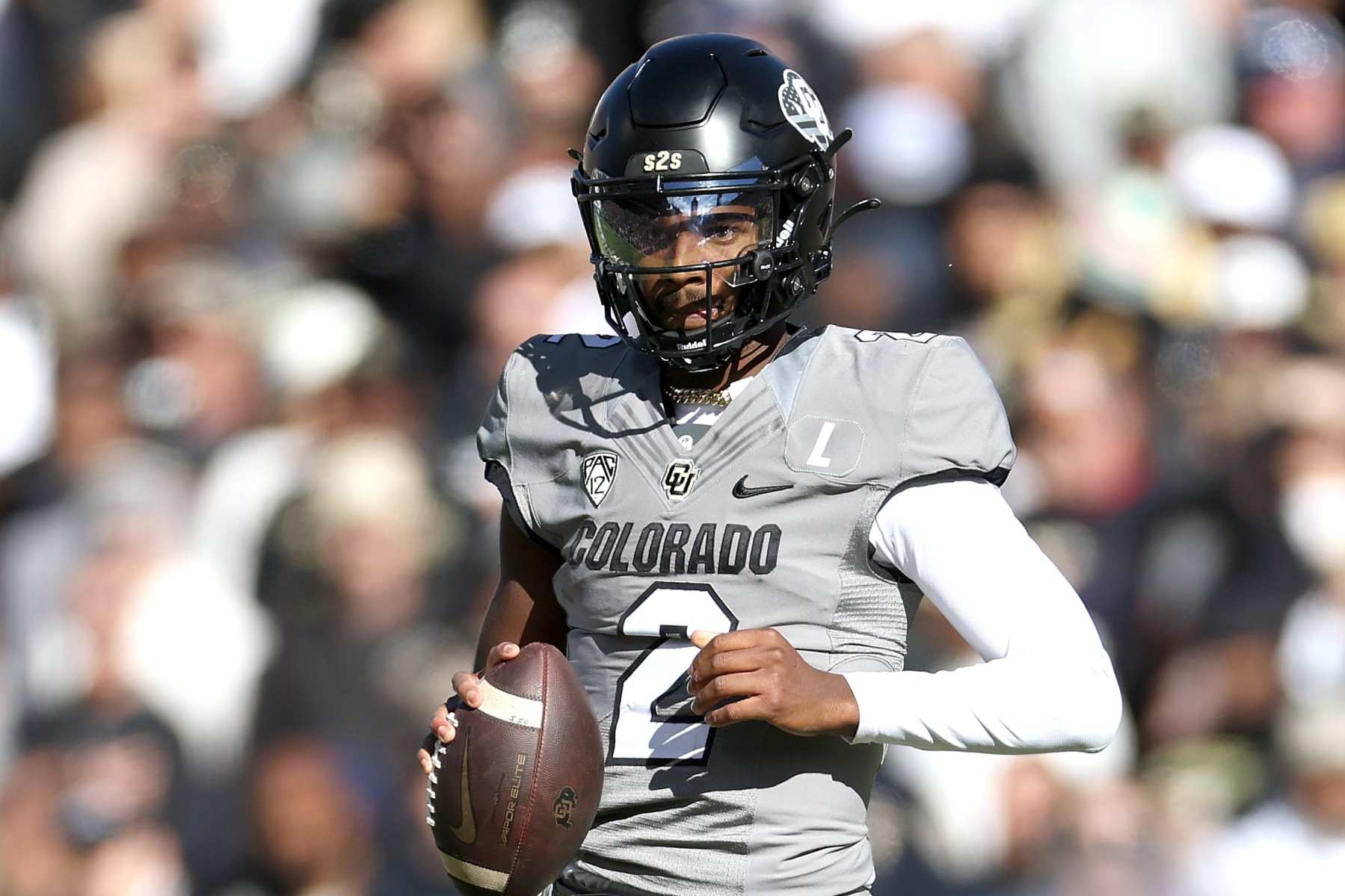 BOULDER, COLORADO - NOVEMBER 11: Quarterback Shedeur Sanders #2 of the Colorado Buffaloes runs out of the pocket against the Arizona Wildcats in the first quarter at Folsom Field on November 11, 2023 in Boulder, Colorado. (Photo by Matthew Stockman/Getty Images)