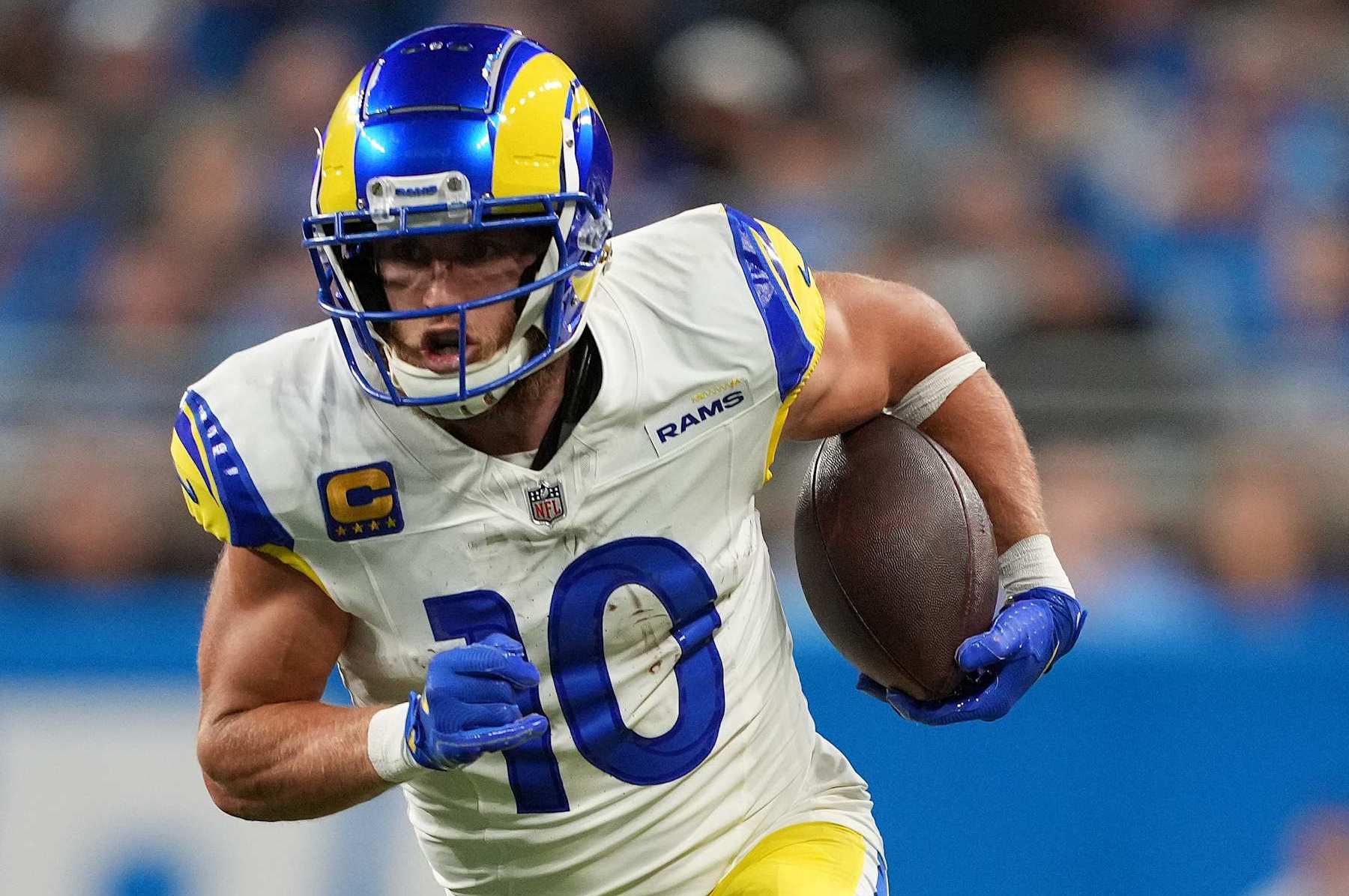 DETROIT, MICHIGAN - SEPTEMBER 08: Cooper Kupp #10 of the Los Angeles Rams runs with the ball against the Detroit Lions at Ford Field on September 08, 2024 in Detroit, Michigan. (Photo by Nic Antaya/Getty Images)