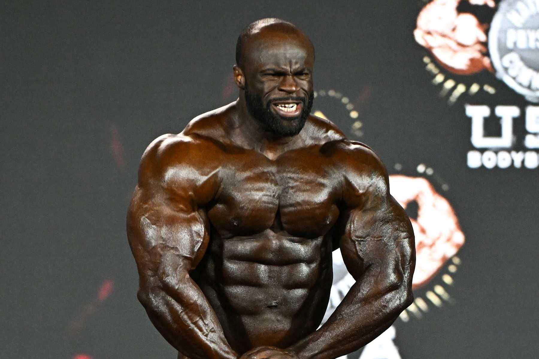 LAS VEGAS, NEVADA - DECEMBER 16, 2022: Samson Dauda competes in the Mr. Olympia event during the Olympia Fitness & Performance weekend at Planet Hollywood Resort and Casino on December 16, 2022 in Las Vegas, Nevada. (Photo by Chris Bernacchi/Diamond Images via Getty Images)