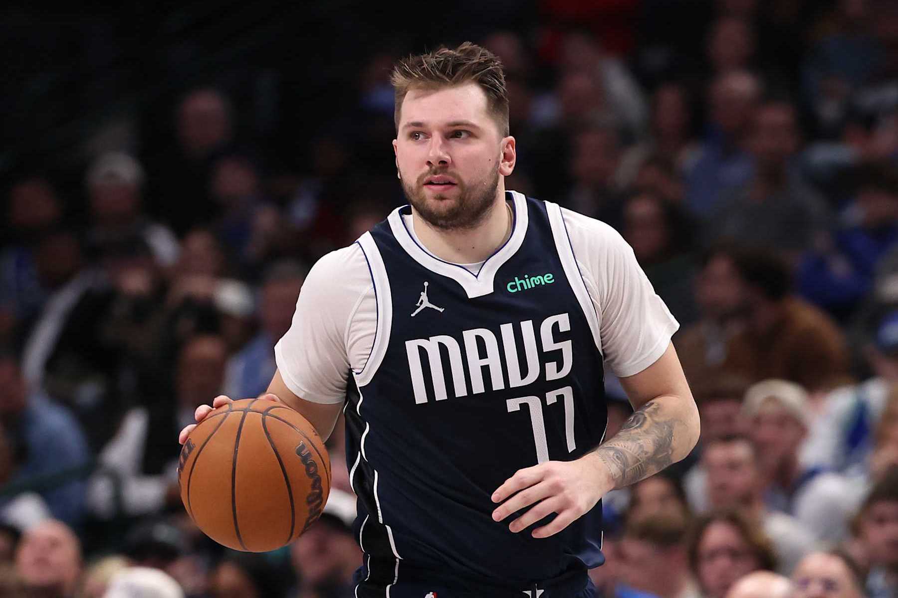 DALLAS, TEXAS - DECEMBER 23: Luka Doncic #77 of the Dallas Mavericks brings the ball up court during the first half against the Portland Trail Blazers at American Airlines Center on December 23, 2024 in Dallas, Texas. NOTE TO USER: User expressly acknowledges and agrees that, by downloading and/or using this photograph, user is consenting to the terms and conditions of the Getty Images License Agreement. (Photo by Sam Hodde/Getty Images)