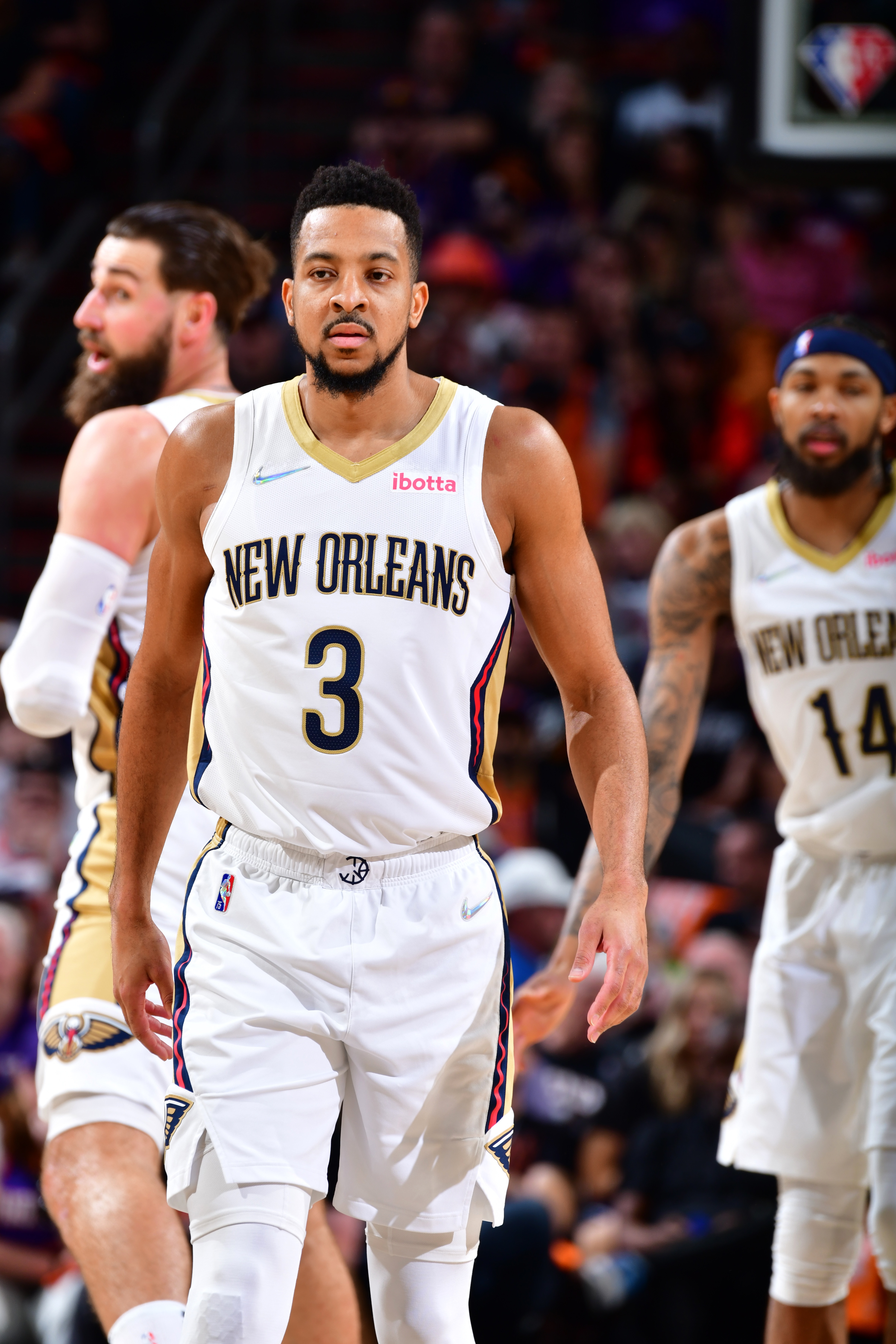 PHOENIX, AZ - APRIL 19: CJ McCollum #3 of the New Orleans Pelicans looks on against the Phoenix Suns during Round 1 Game 2 of the NBA 2022 Playoffs on April 19, 2022 at Footprint Center in Phoenix, Arizona. NOTE TO USER: User expressly acknowledges and agrees that, by downloading and or using this photograph, user is consenting to the terms and conditions of the Getty Images License Agreement. Mandatory Copyright Notice: Copyright 2022 NBAE (Photo by Barry Gossage/NBAE via Getty Images)