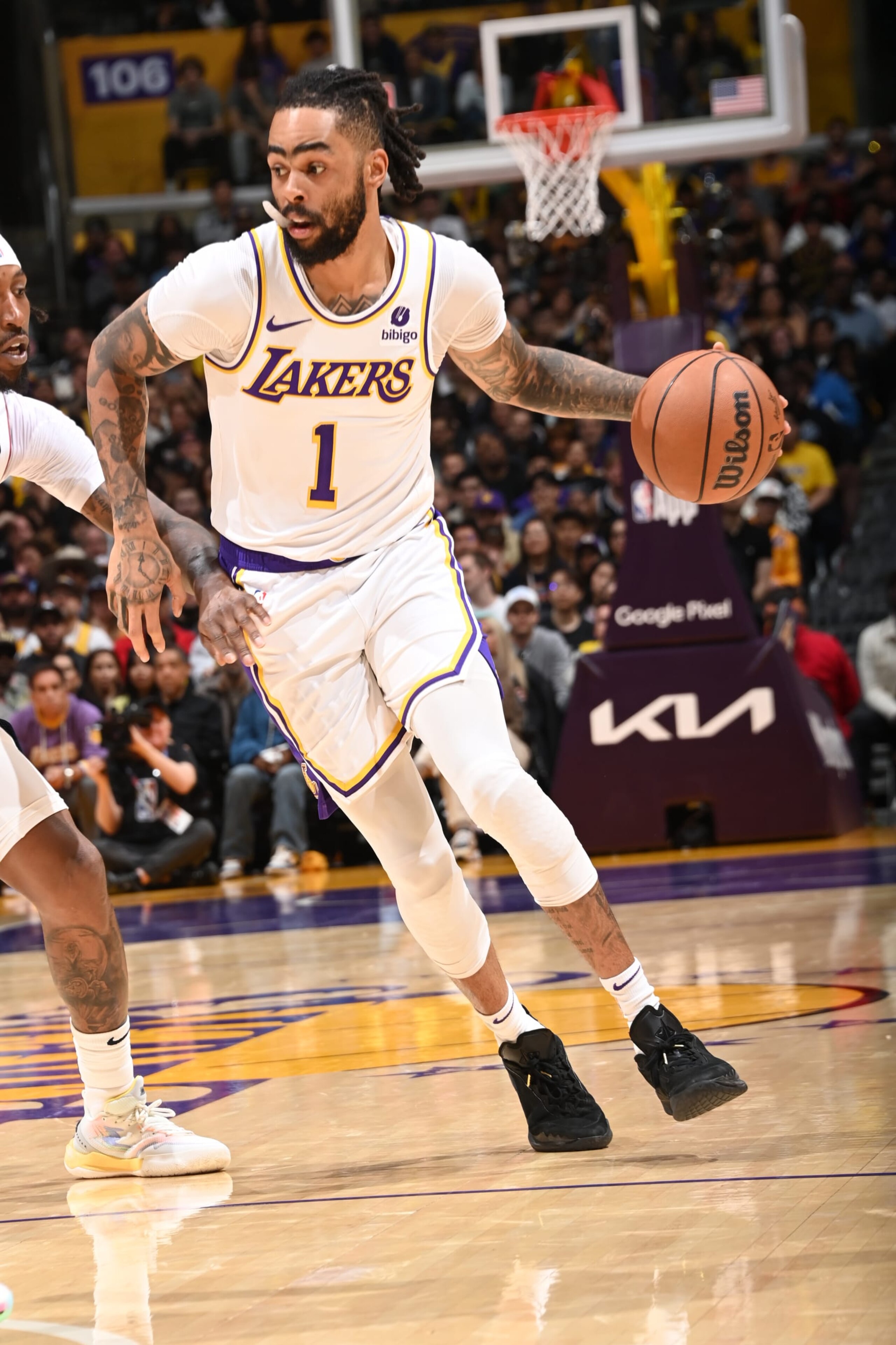 LOS ANGELES, CA - APRIL 27: D'Angelo Russell #1 of the Los Angeles Lakers dribbles the ball during the game against the Denver Nuggets during Round 1 Game 4 of the 2024 NBA Playoffs on April 27, 2024 at Crypto.Com Arena in Los Angeles, California. NOTE TO USER: User expressly acknowledges and agrees that, by downloading and/or using this Photograph, user is consenting to the terms and conditions of the Getty Images License Agreement. Mandatory Copyright Notice: Copyright 2024 NBAE (Photo by Andrew D. Bernstein/NBAE via Getty Images)