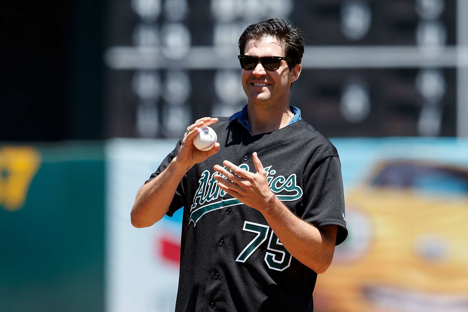 OAKLAND, CA - JULY 01:  Former pitcher Barry Zito of the Oakland Athletics tosses out the ceremonial first pitch before the game agains the Atlanta Braves at the Oakland Coliseum on July 1, 2017 in Oakland, California. The Atlanta Braves defeated the Oakland Athletics 4-3.  (Photo by Jason O. Watson/Getty Images)