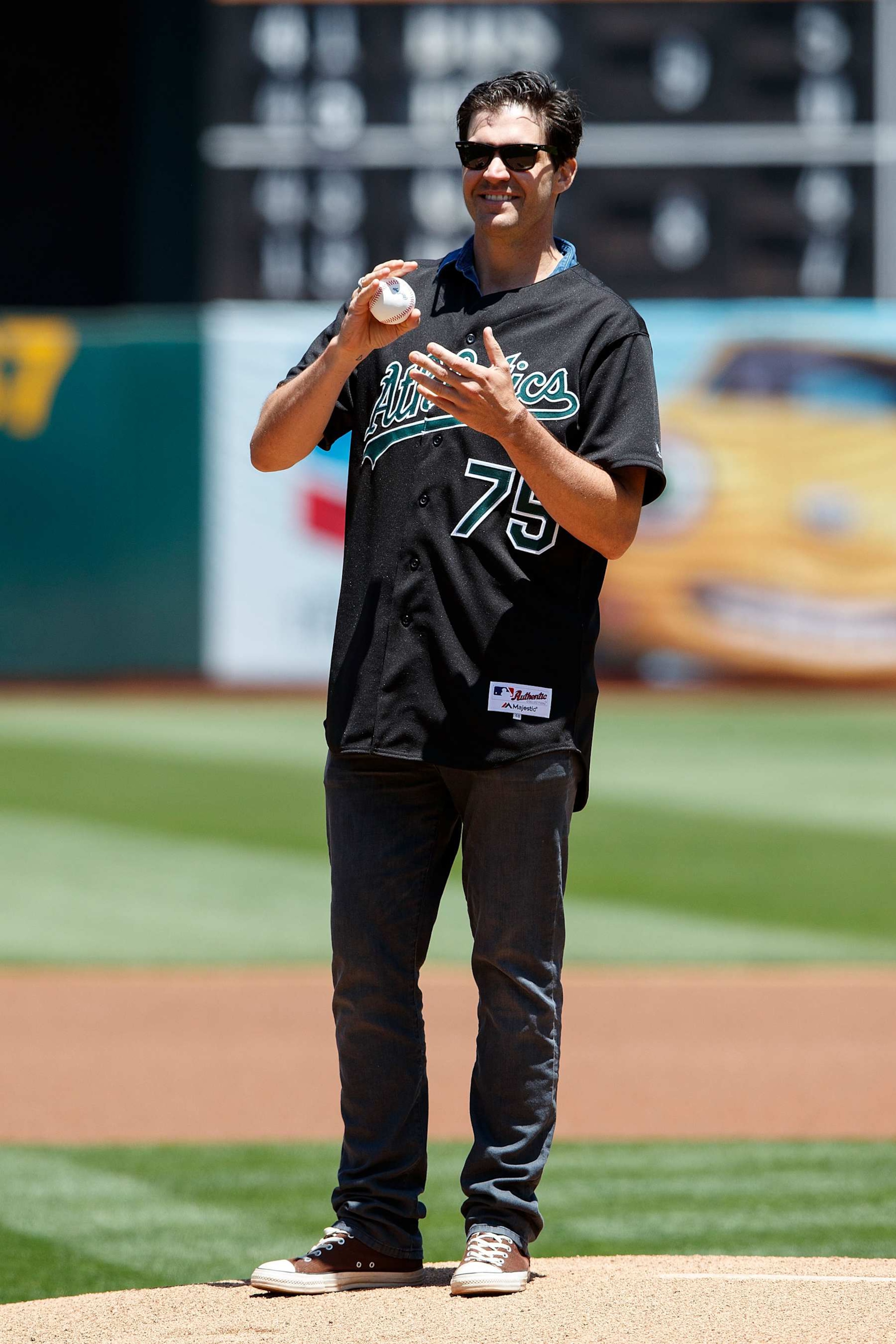 OAKLAND, CA - JULY 01:  Former pitcher Barry Zito of the Oakland Athletics tosses out the ceremonial first pitch before the game agains the Atlanta Braves at the Oakland Coliseum on July 1, 2017 in Oakland, California. The Atlanta Braves defeated the Oakland Athletics 4-3.  (Photo by Jason O. Watson/Getty Images)